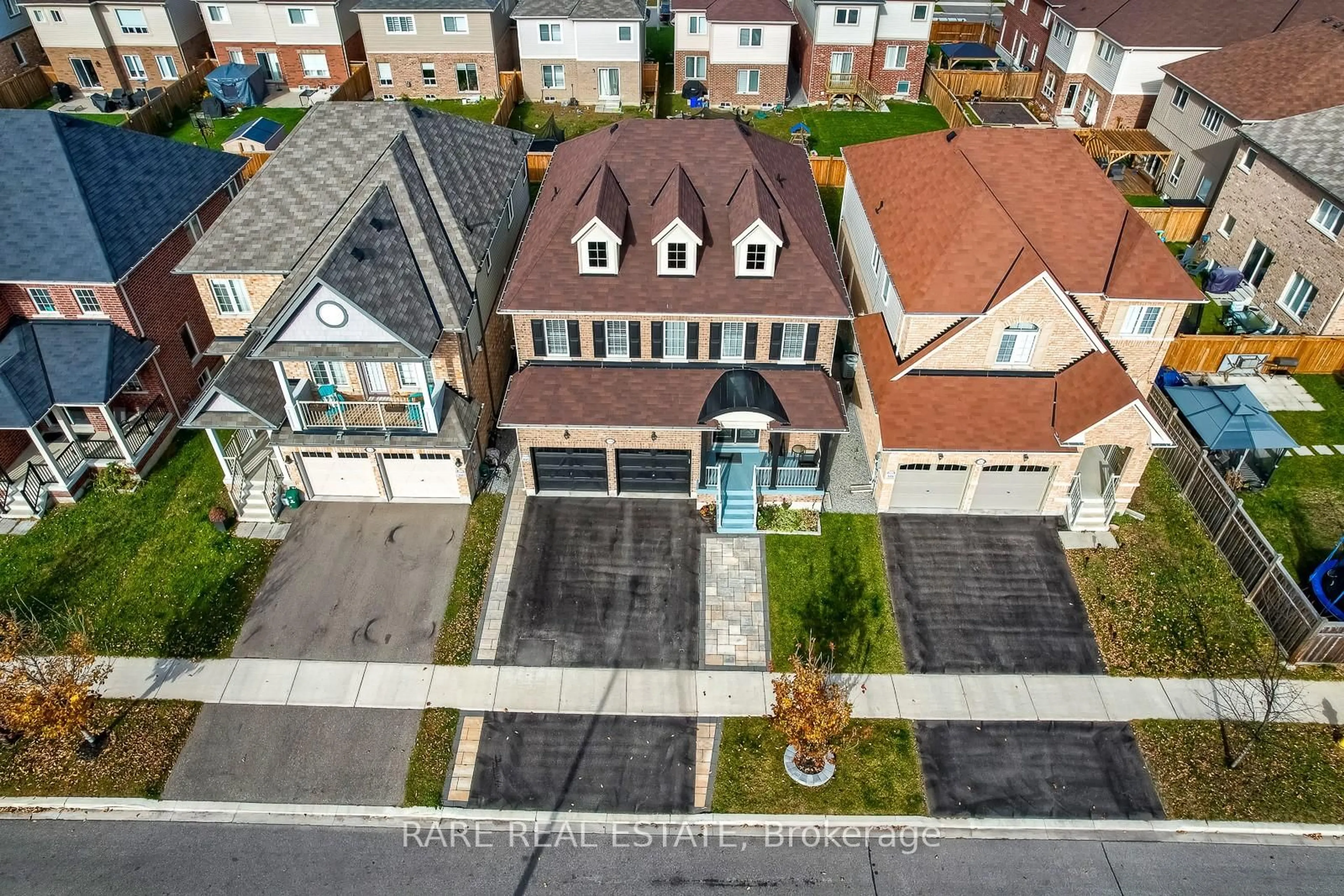 A pic from outside/outdoor area/front of a property/back of a property/a pic from drone, street for 50 Henry Smith Ave, Clarington Ontario L1C 0W1
