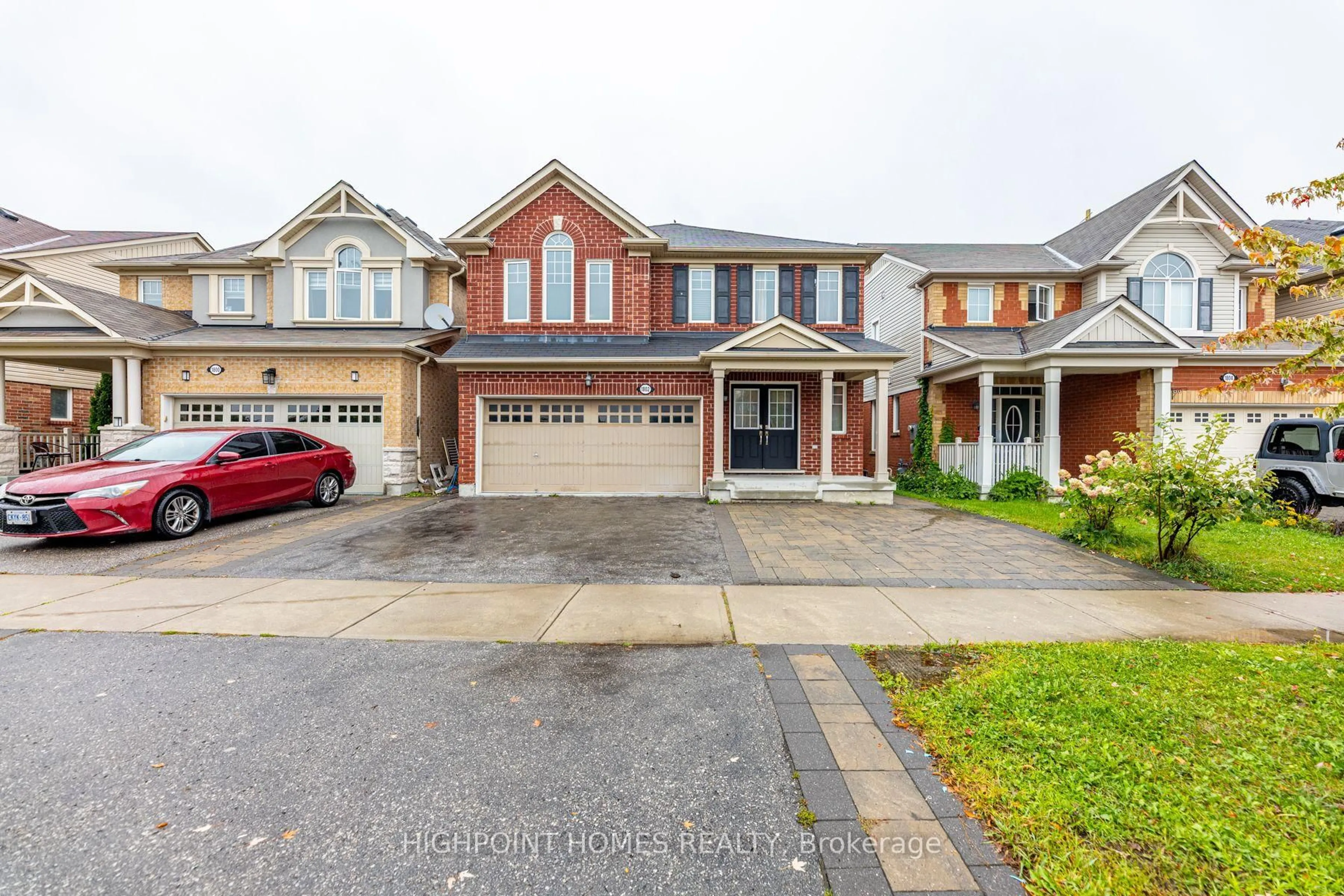 Home with brick exterior material, street for 1802 Liatris Dr, Pickering Ontario L1X 0A8