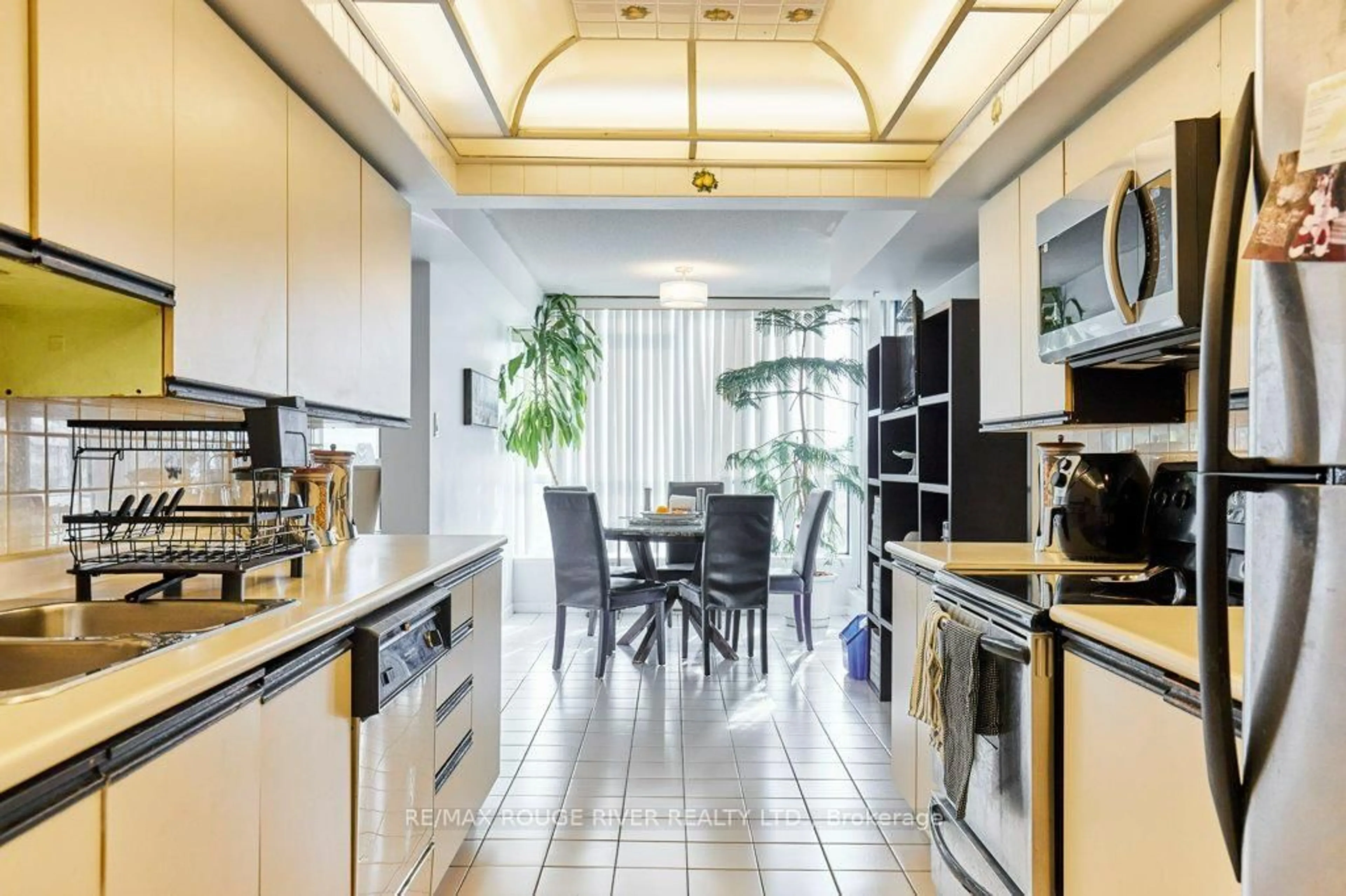 Open concept kitchen, ceramic/tile floor for 4725 Sheppard Ave #1103, Toronto Ontario M1S 5B2
