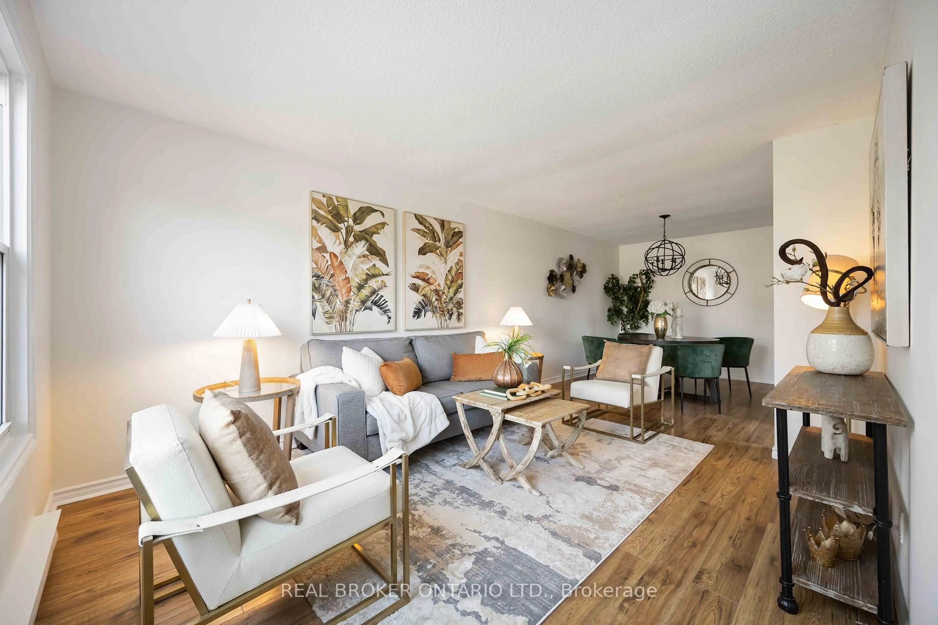 Living room with furniture, wood/laminate floor for 602 Dorchester Dr, Oshawa Ontario L1J 6L5