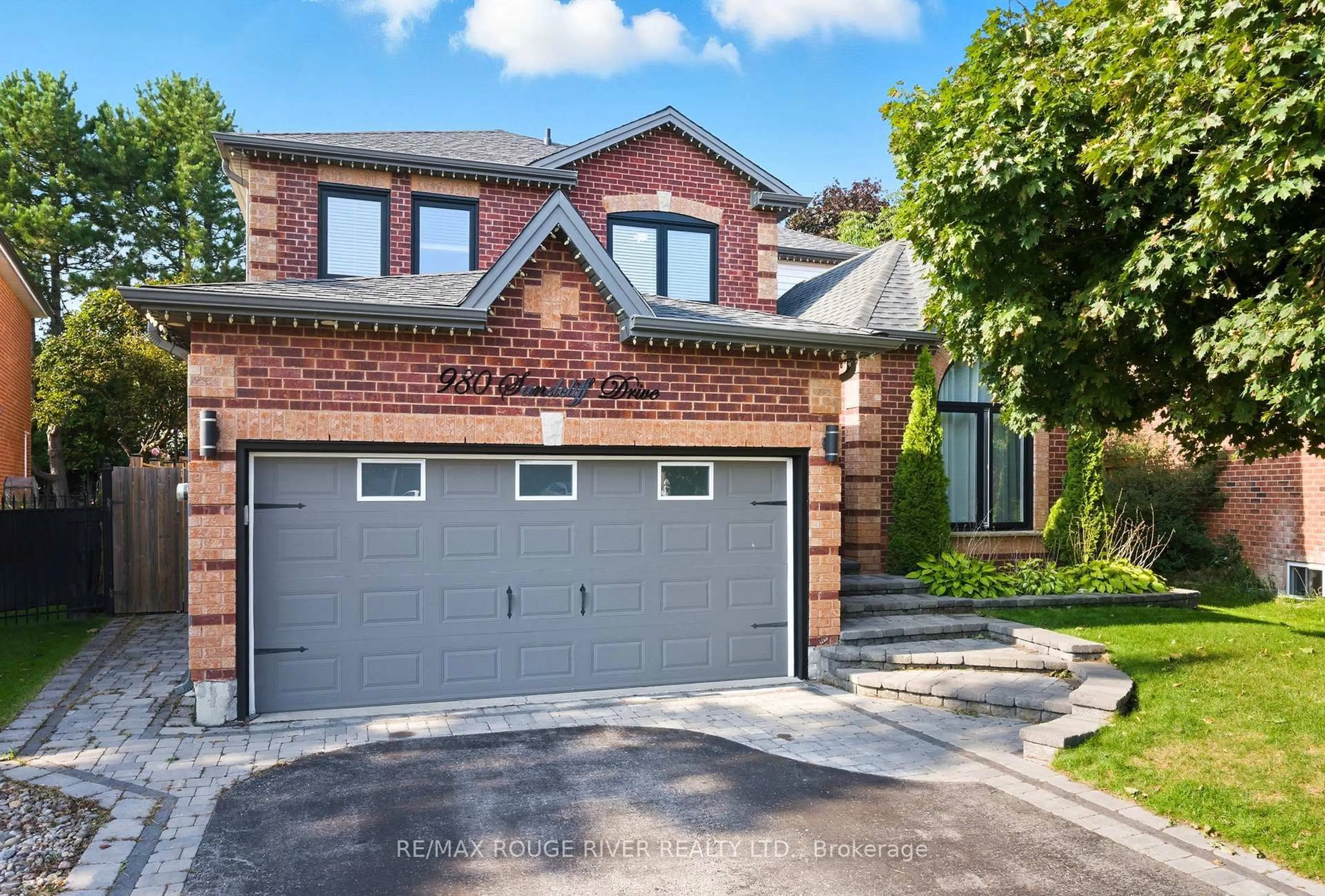 Home with brick exterior material, street for 980 Sandcliff Dr, Oshawa Ontario L1K 2E4