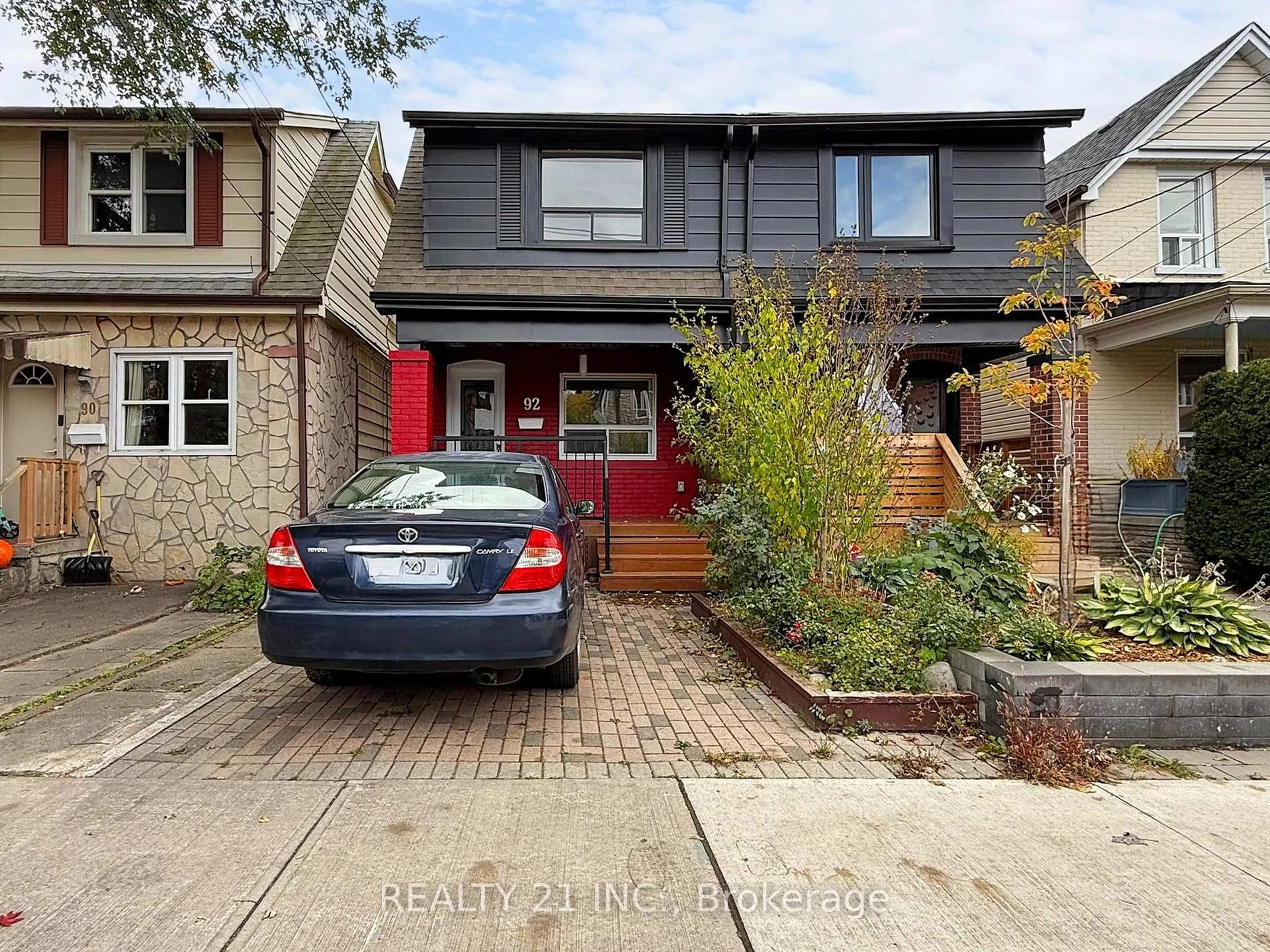 Home with brick exterior material, street for 92 King Edward Ave Ave, Toronto Ontario M4C 5J6