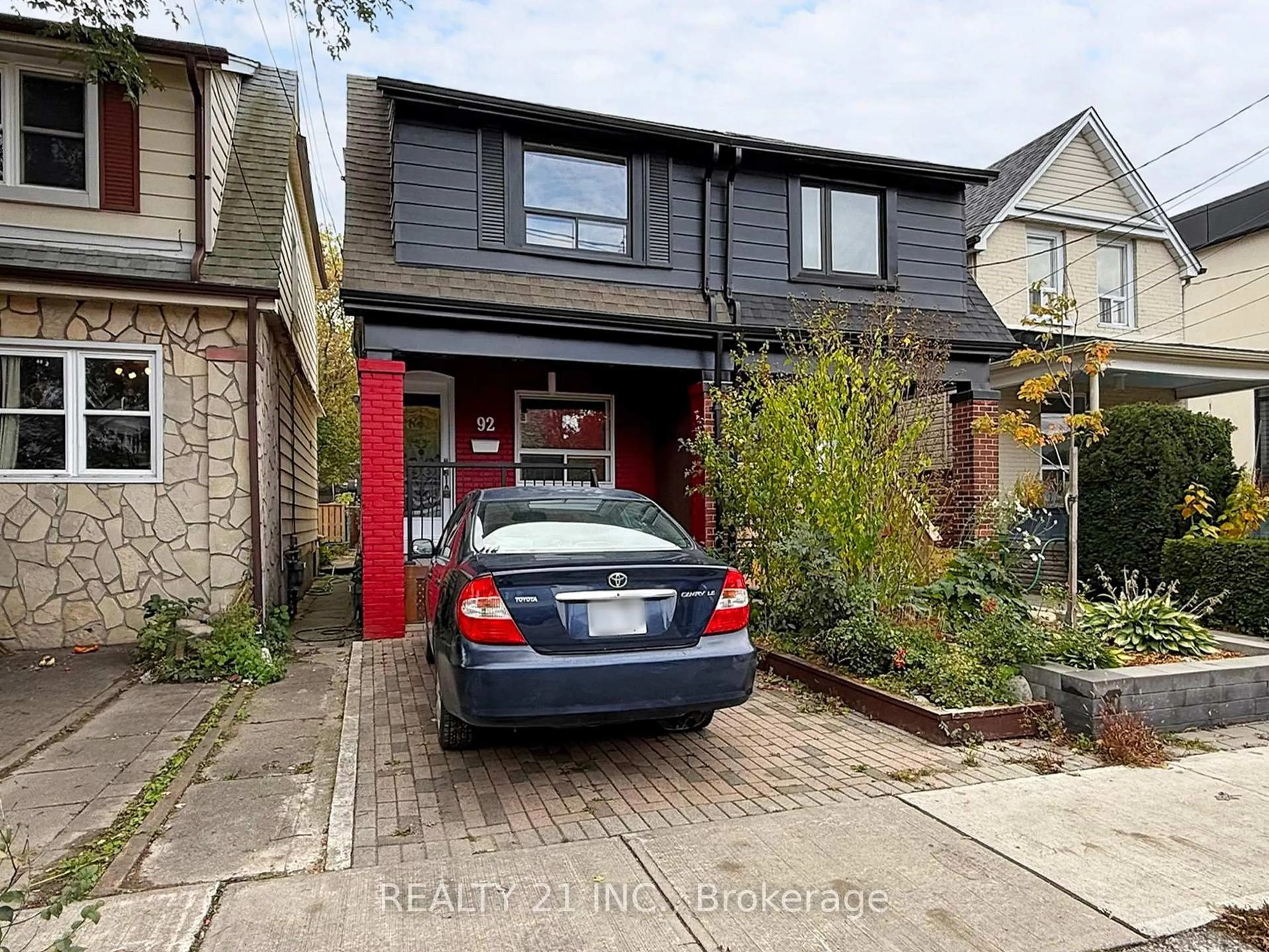 Home with brick exterior material, street for 92 King Edward Ave Ave, Toronto Ontario M4C 5J6