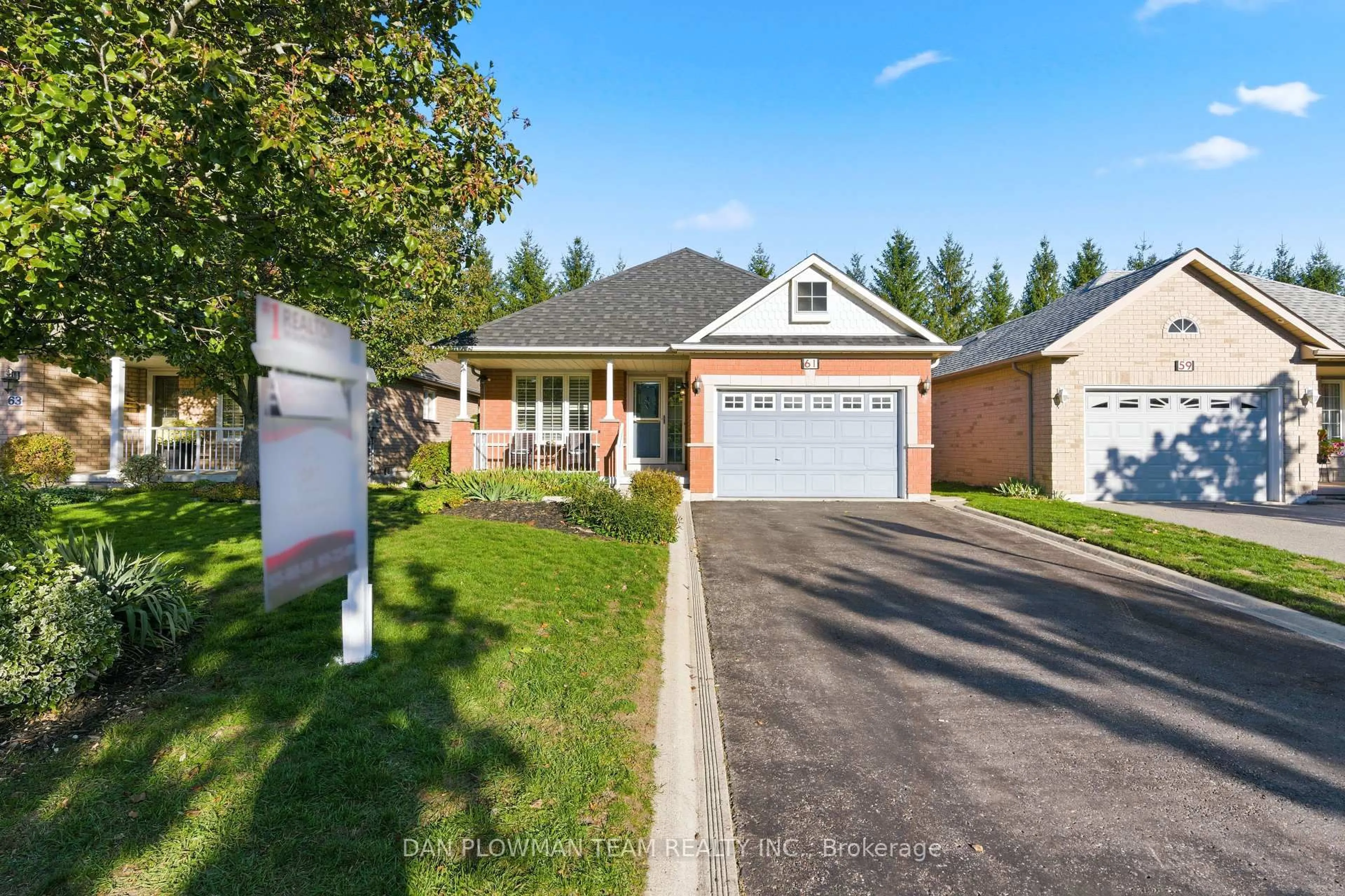 Home with brick exterior material, street for 61 Lady May Dr, Whitby Ontario L1R 3A7