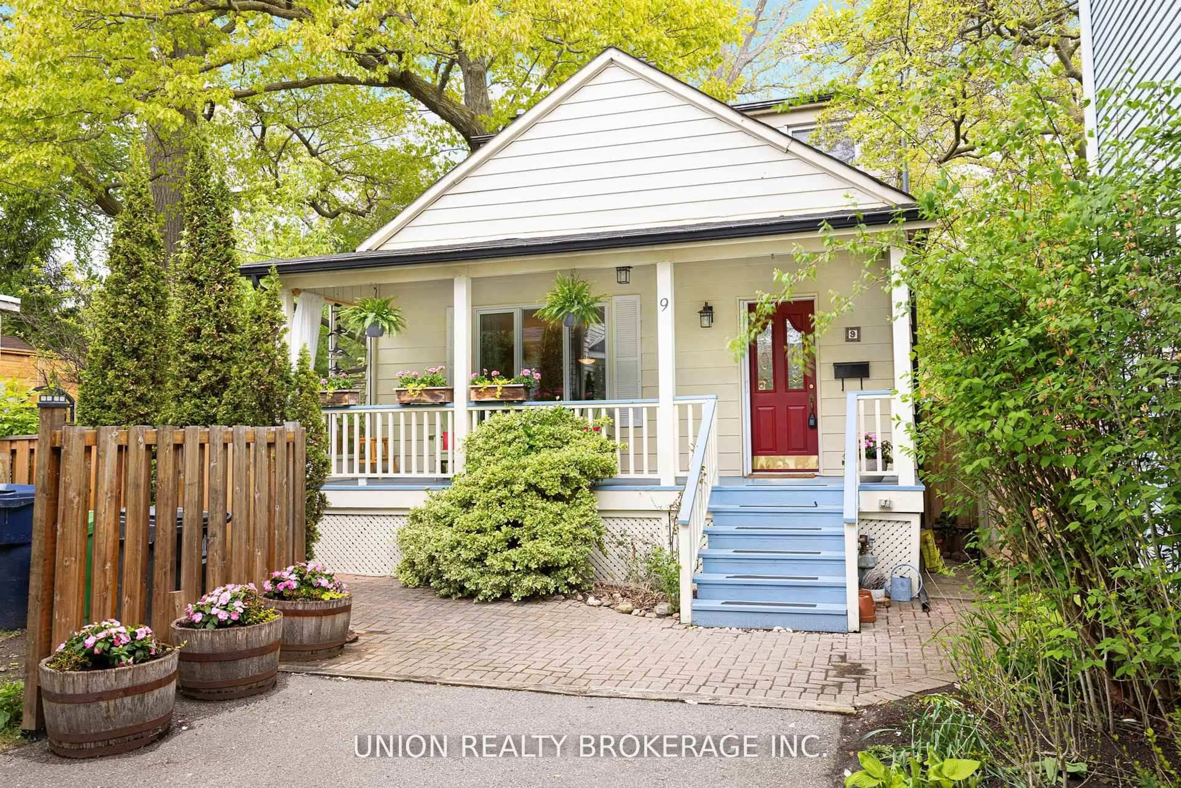 Home with vinyl exterior material, street for 9 Elmer Ave, Toronto Ontario M4L 3R6