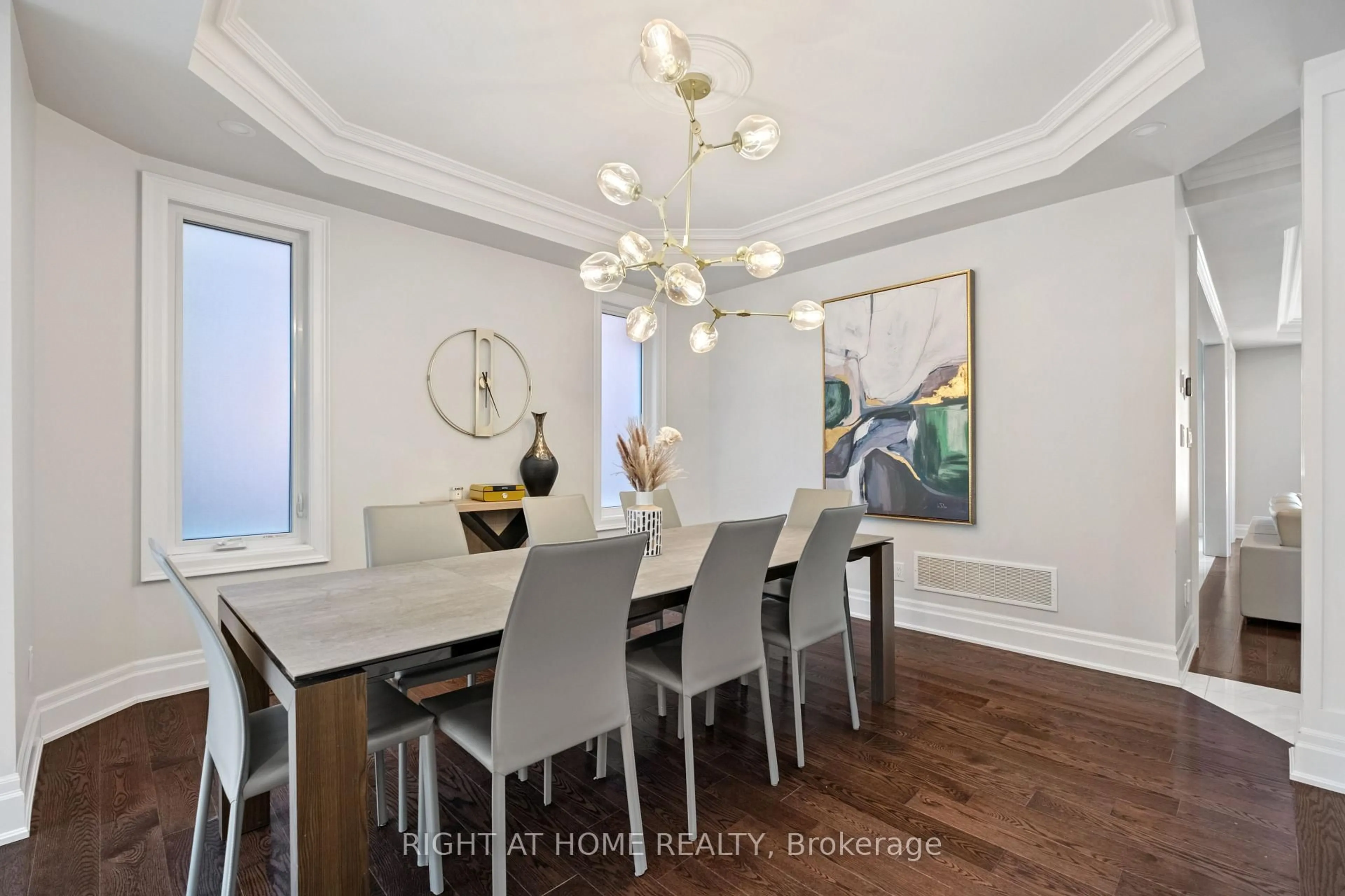 Dining room, wood/laminate floor for 20b Leafield St, Toronto Ontario M1W 2T2