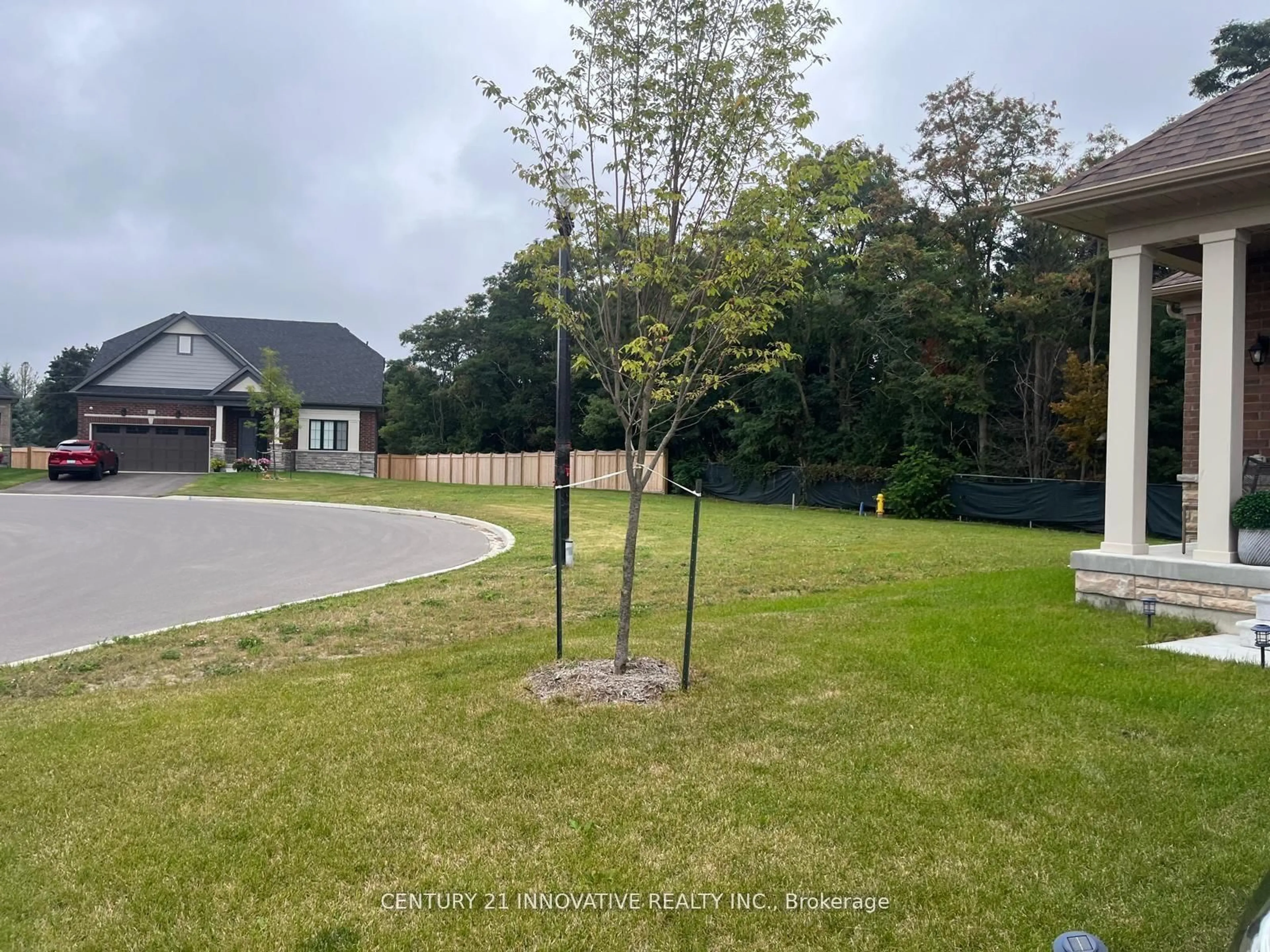 A pic from outside/outdoor area/front of a property/back of a property/a pic from drone, forest/trees view for 22 Holtby Crt, Scugog Ontario L9L 0B4
