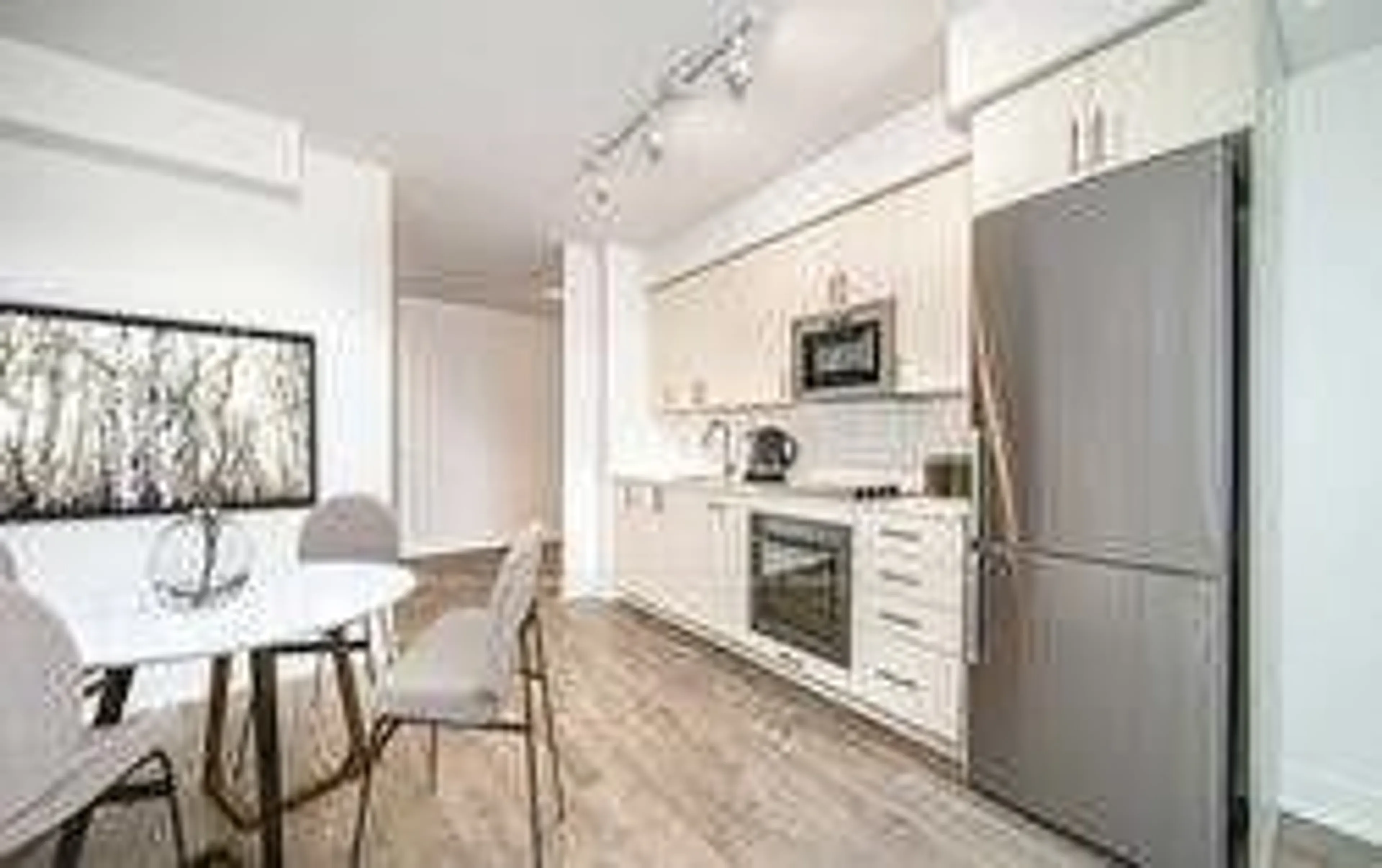 Open concept kitchen, wood/laminate floor for 2550 Simcoe St #1211, Oshawa Ontario L1L 0R5