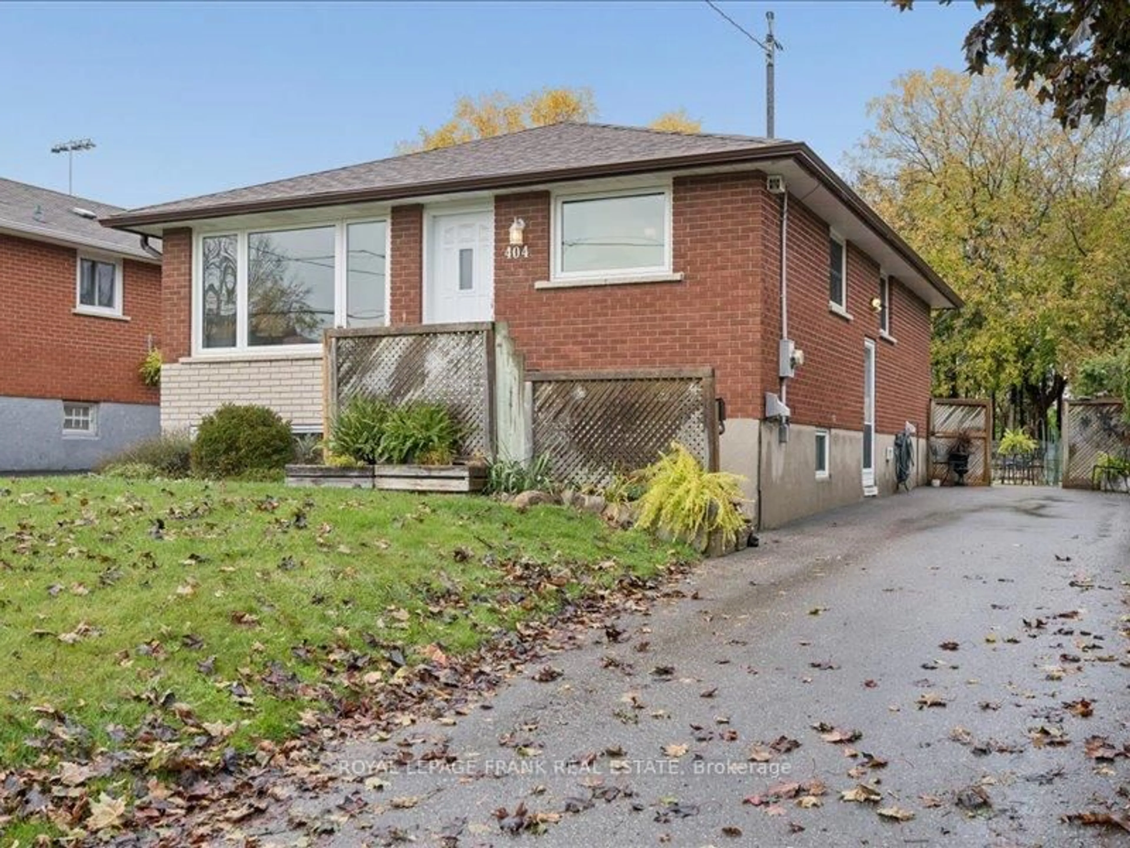 Home with brick exterior material, street for 404 Conant St, Oshawa Ontario L1H 3S6