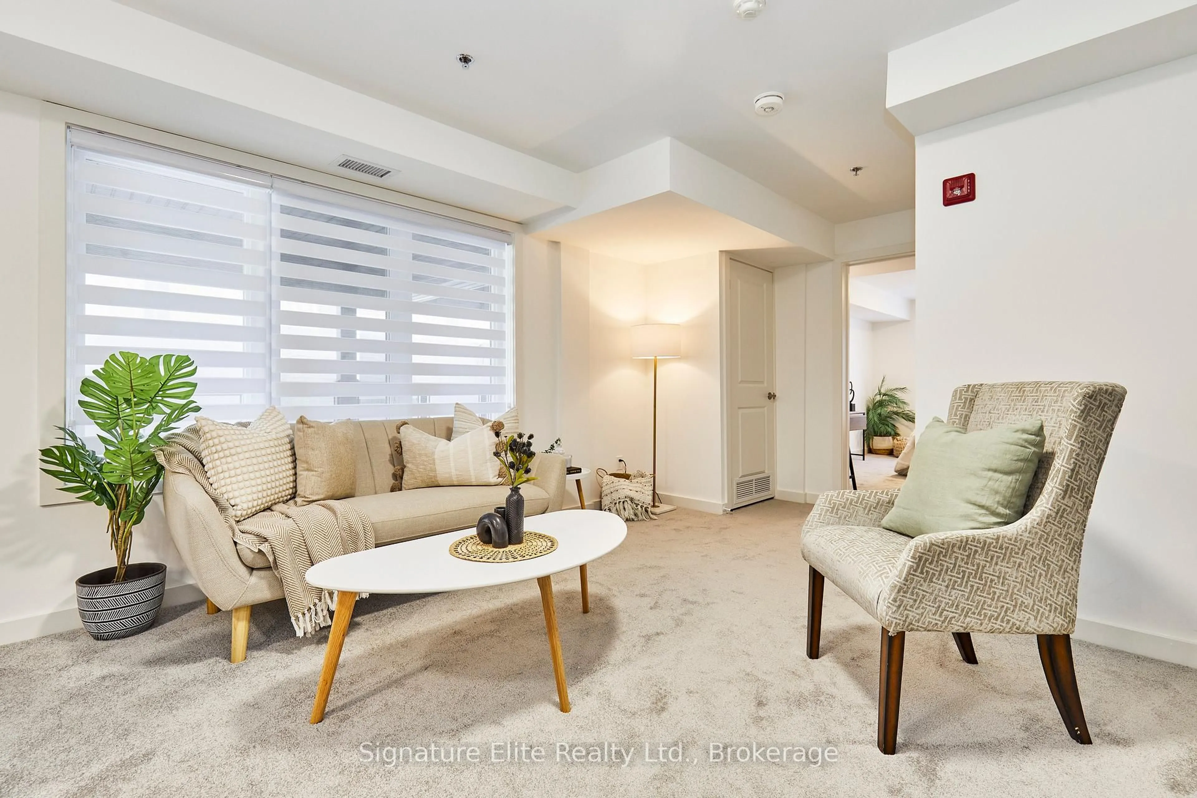 Living room with furniture, ceramic/tile floor for 45 Connaught Ave #201, Toronto Ontario M4L 2V8