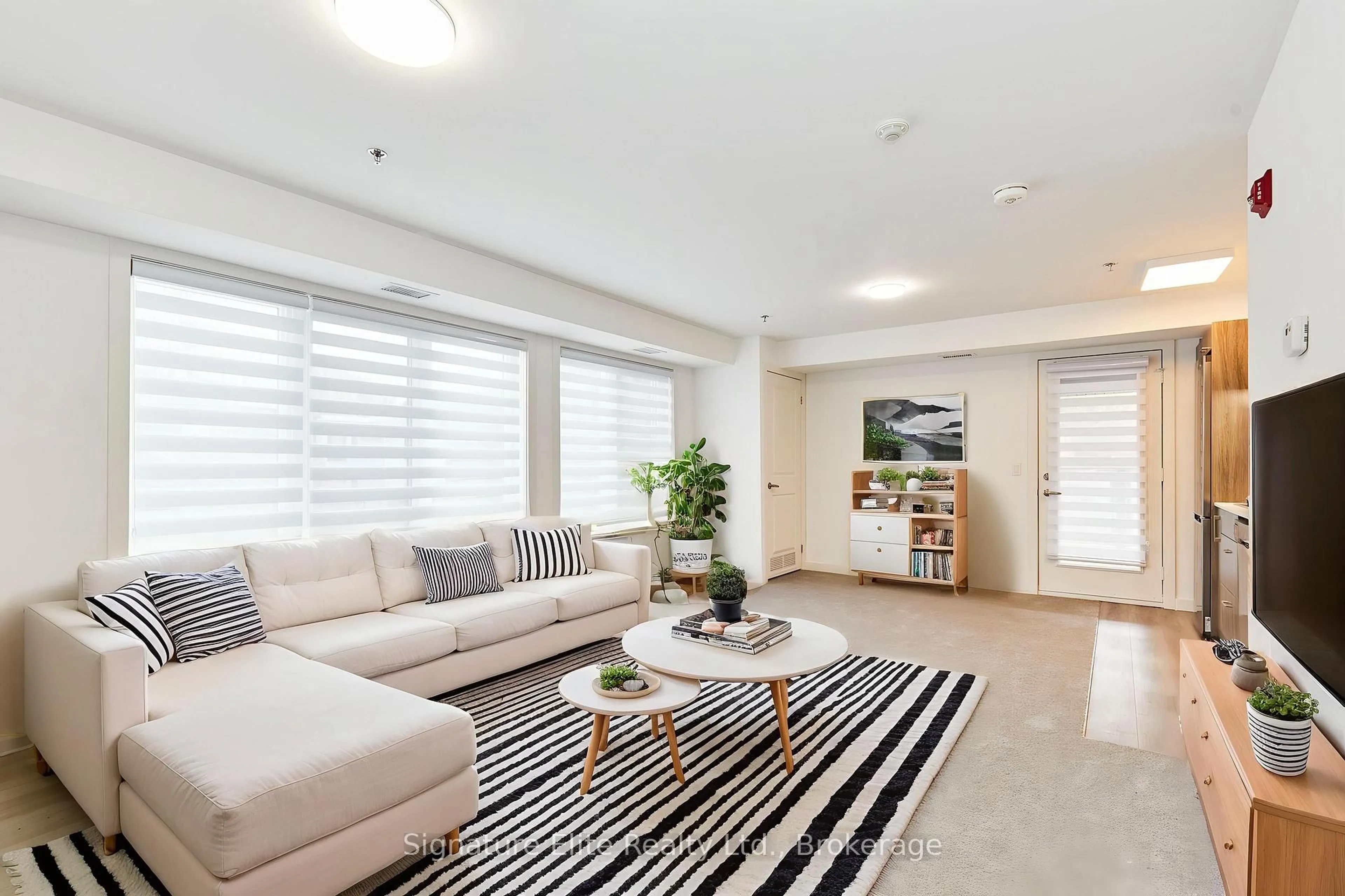 Living room with furniture, unknown for 45 Connaught Ave #202, Toronto Ontario M4L 2V8