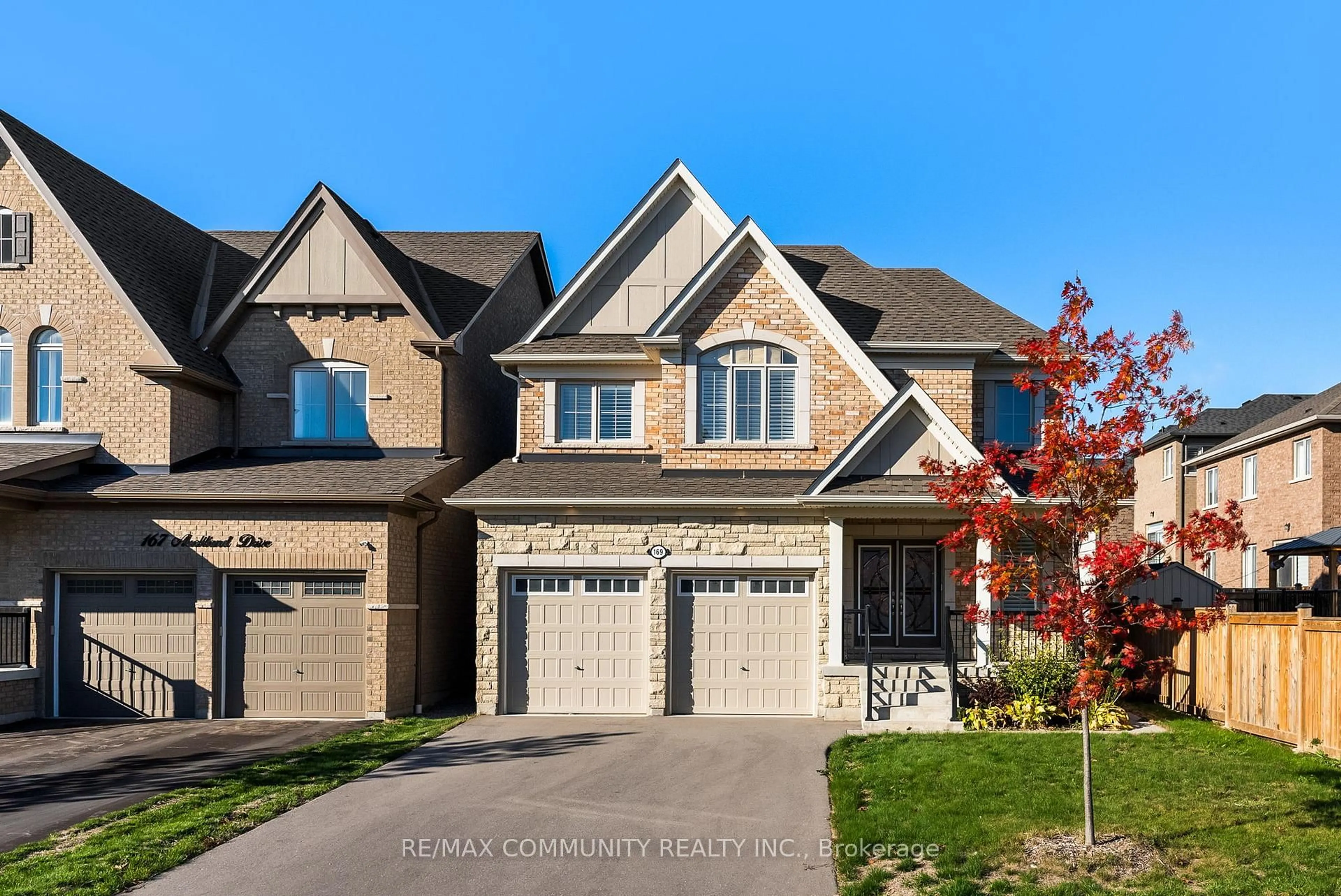 Home with brick exterior material, street for 169 Auckland Dr, Whitby Ontario L1P 0J2
