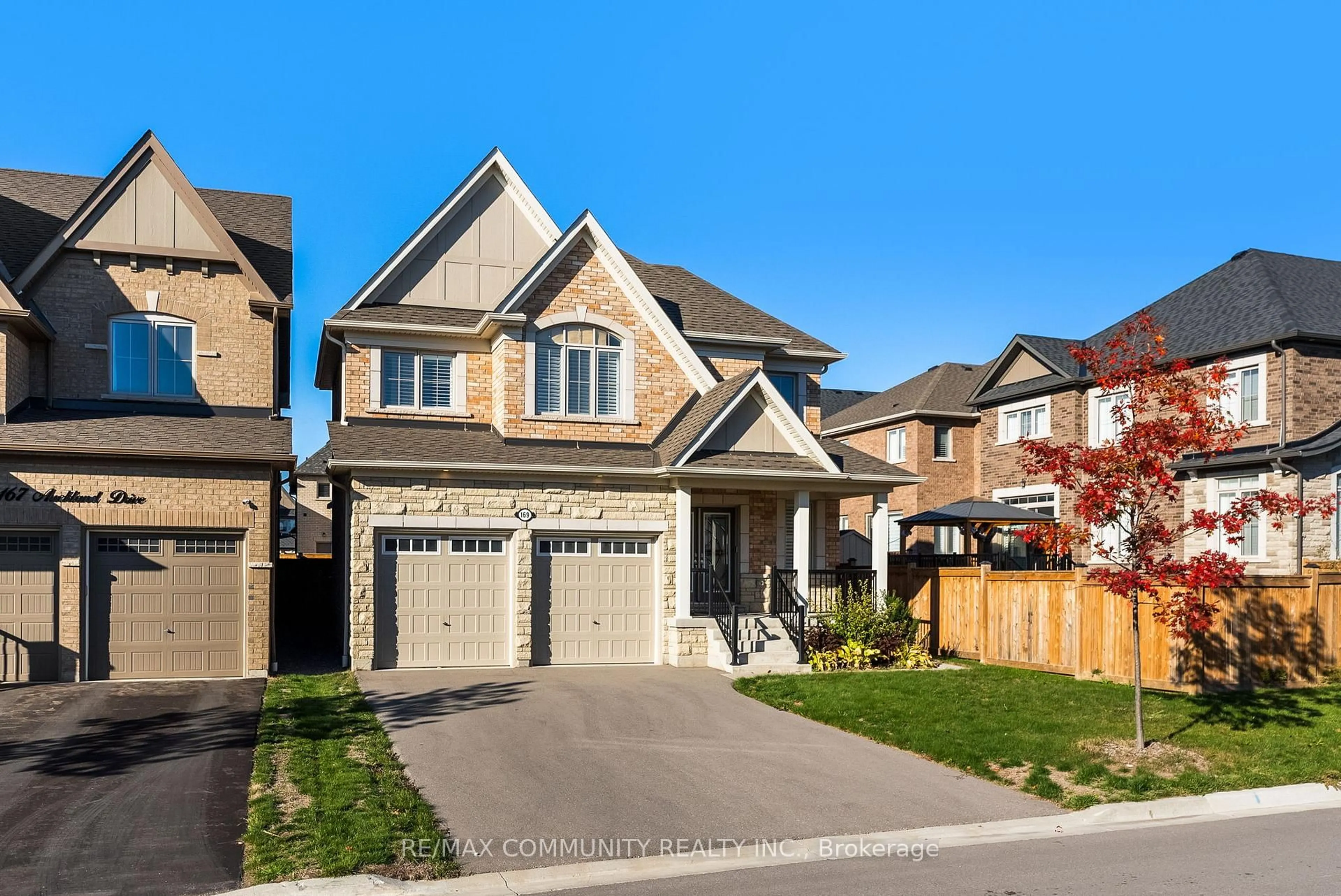 Home with brick exterior material, street for 169 Auckland Dr, Whitby Ontario L1P 0J2