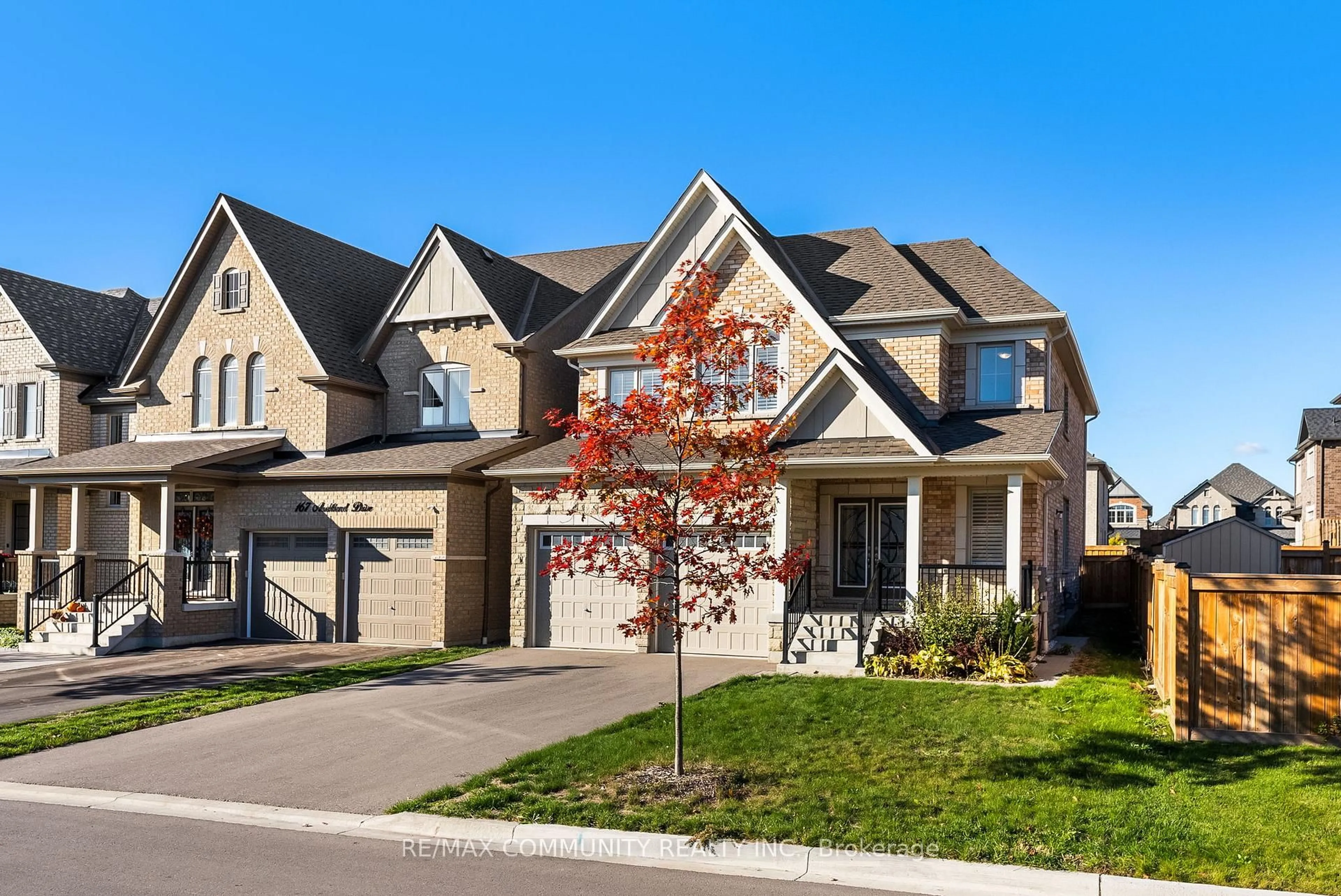 Home with brick exterior material, street for 169 Auckland Dr, Whitby Ontario L1P 0J2