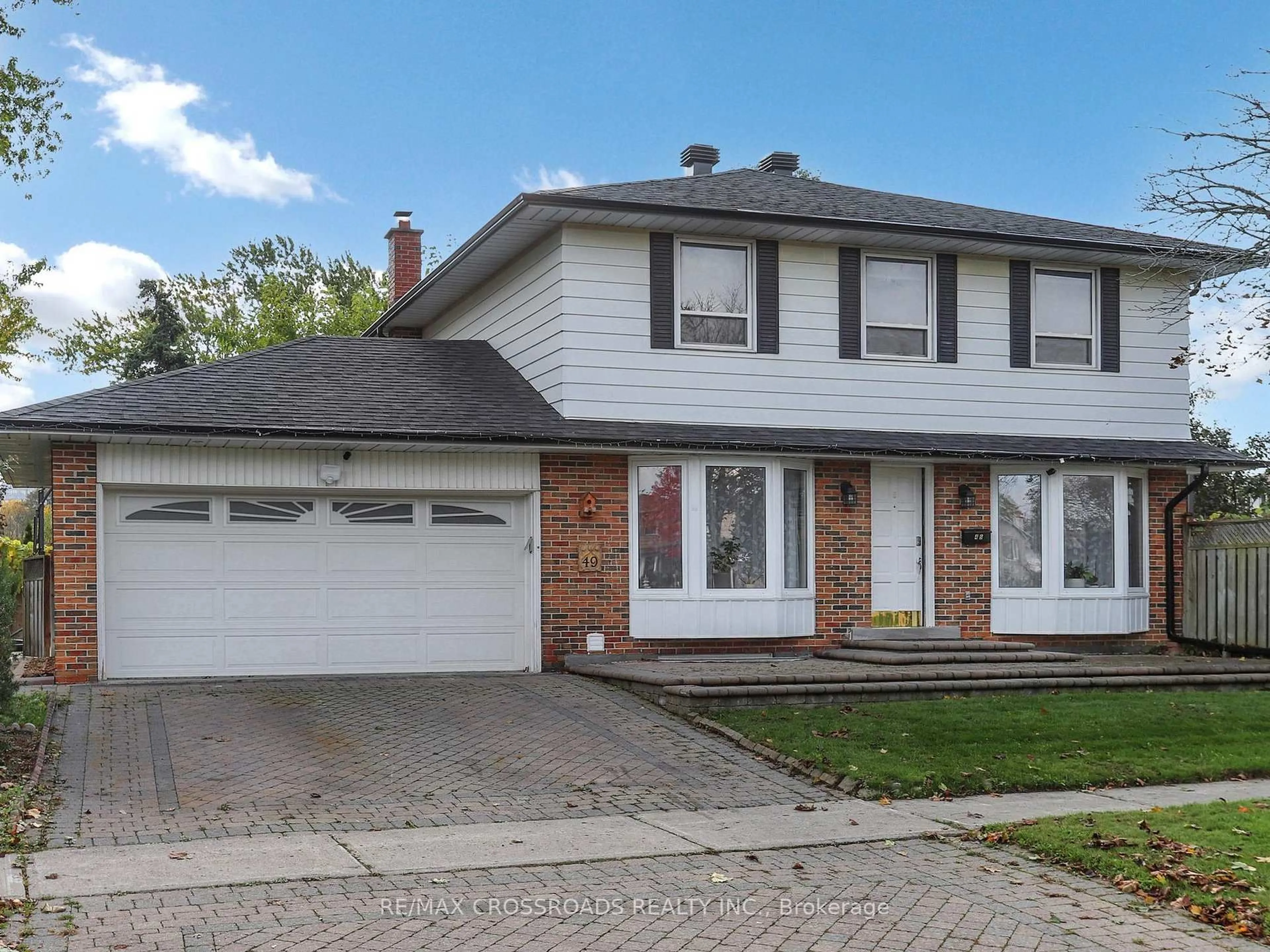 Home with brick exterior material, street for 49 King Louis Cres, Toronto Ontario M1T 2X1