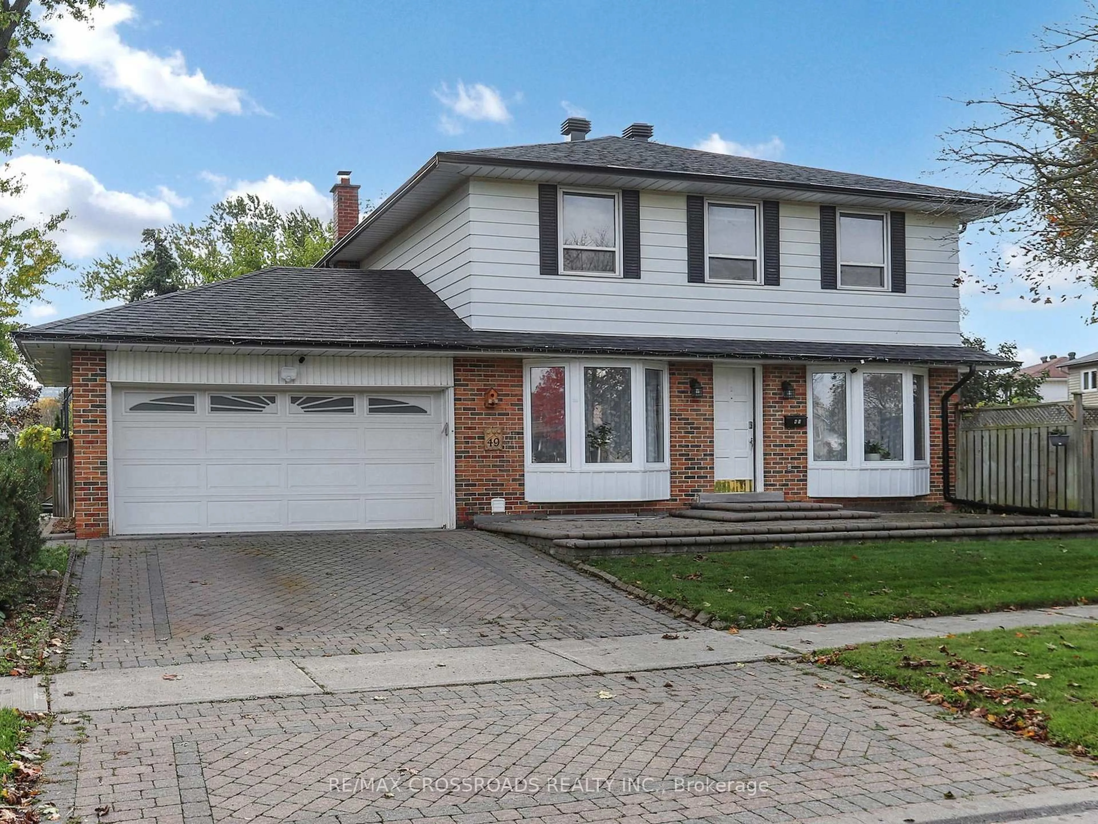 Home with brick exterior material, street for 49 King Louis Cres, Toronto Ontario M1T 2X1