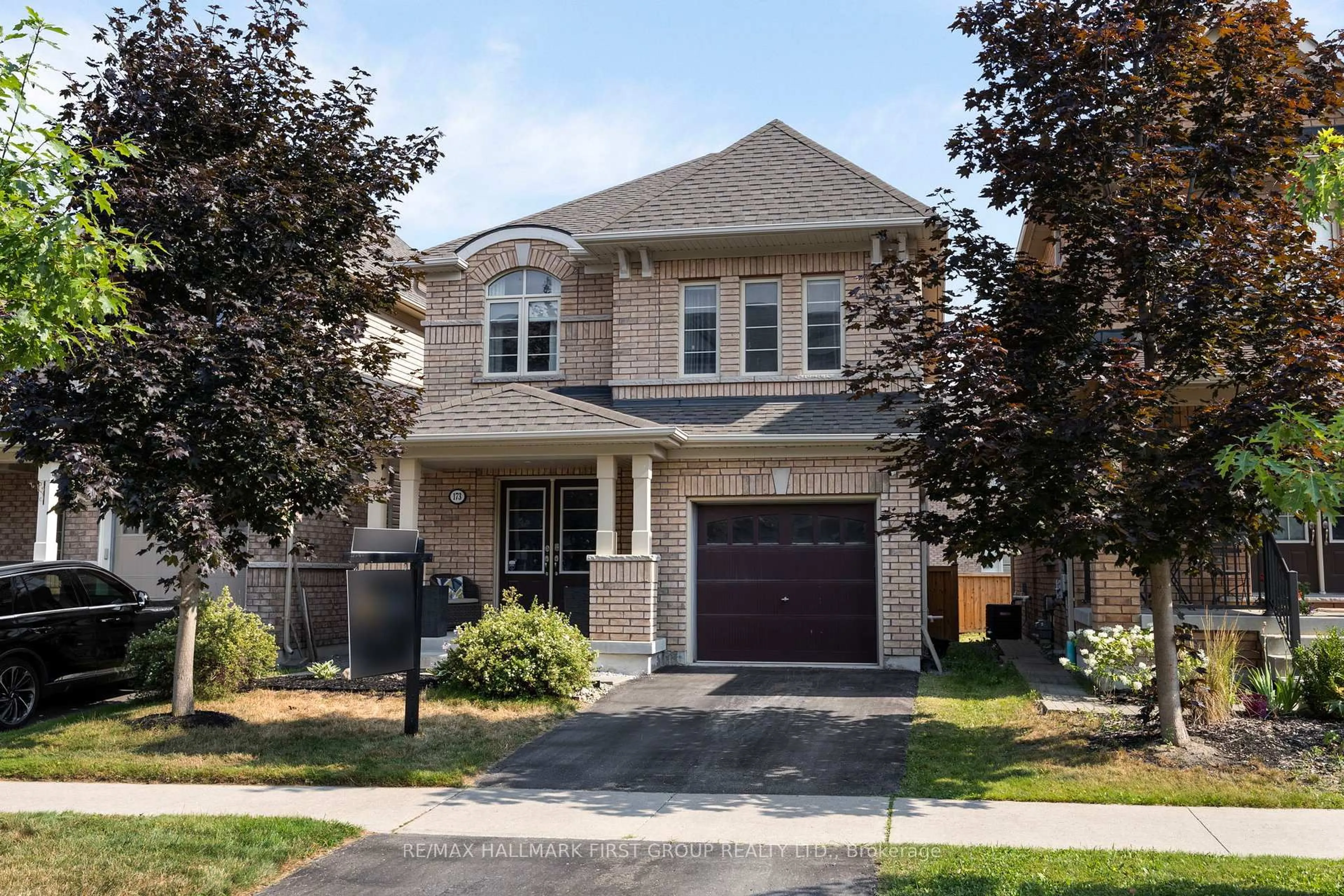 Home with brick exterior material, street for 173 Windfields Farm Dr, Oshawa Ontario L1L 0K2