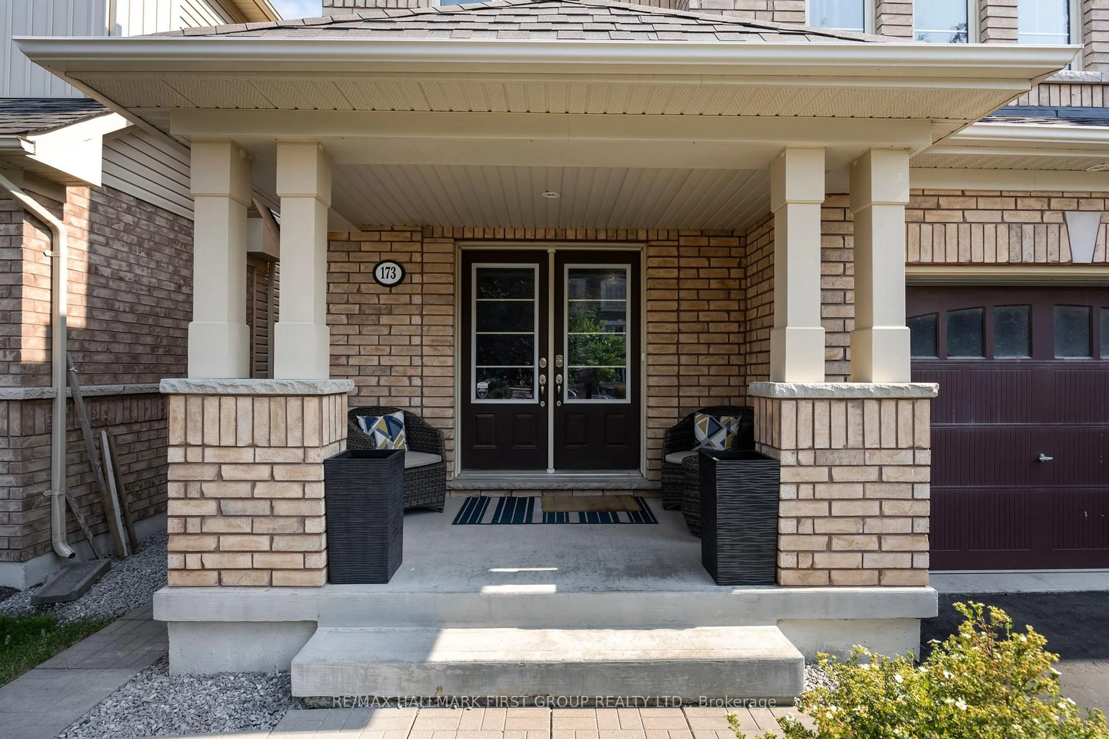 Home with brick exterior material, street for 173 Windfields Farm Dr, Oshawa Ontario L1L 0K2