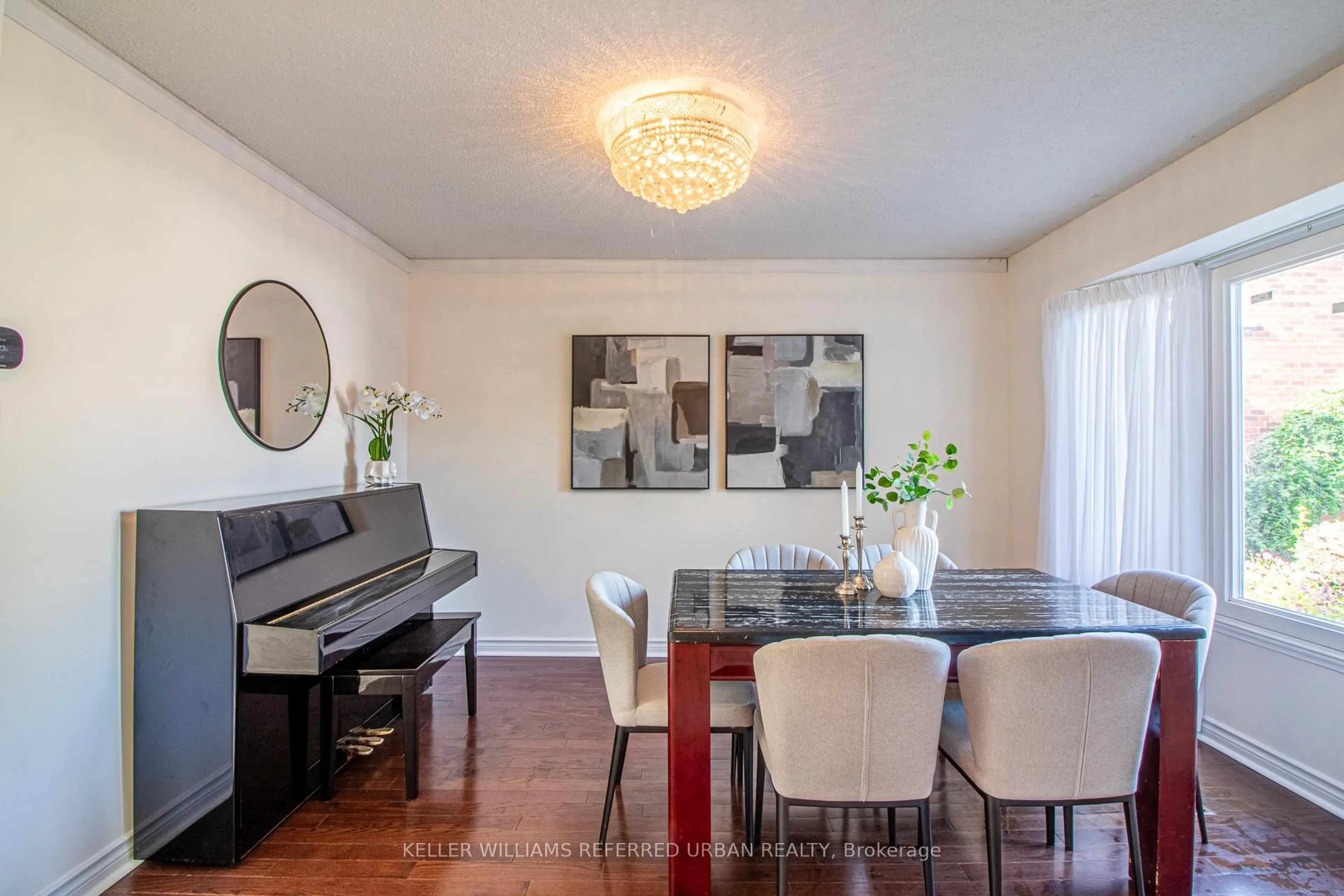 Dining room, wood/laminate floor for 63 Holmbush Cres, Toronto Ontario M1V 2Y8