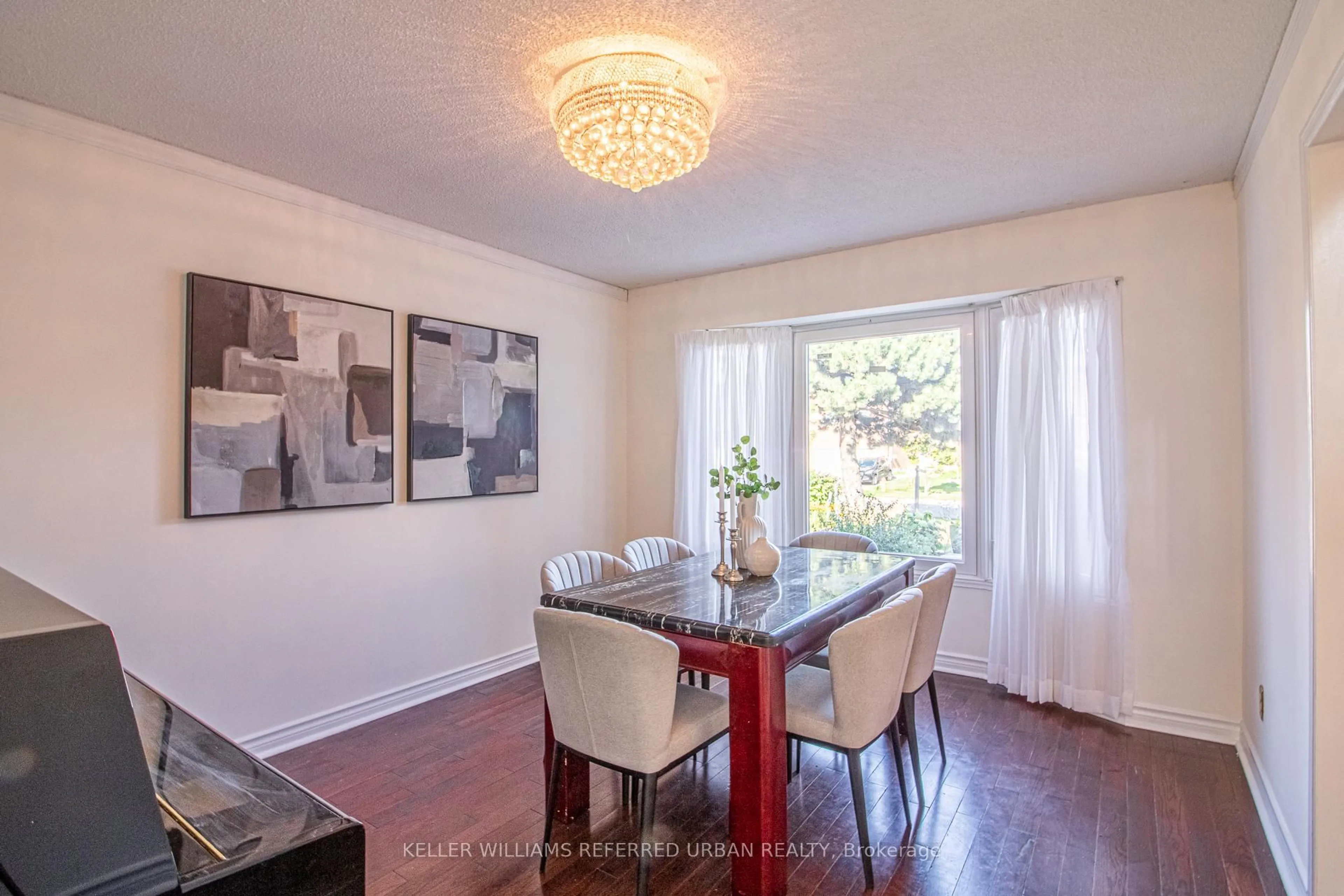 Dining room, wood/laminate floor for 63 Holmbush Cres, Toronto Ontario M1V 2Y8