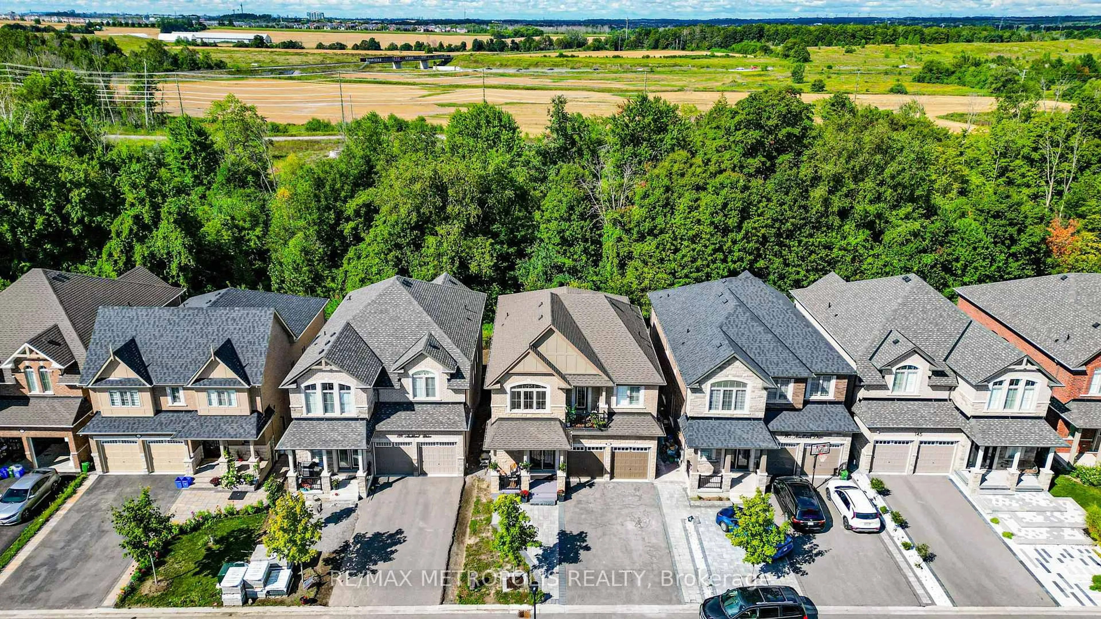 A pic from outside/outdoor area/front of a property/back of a property/a pic from drone, mountain view for 141 AUCKLAND Dr, Whitby Ontario L1P 0J2