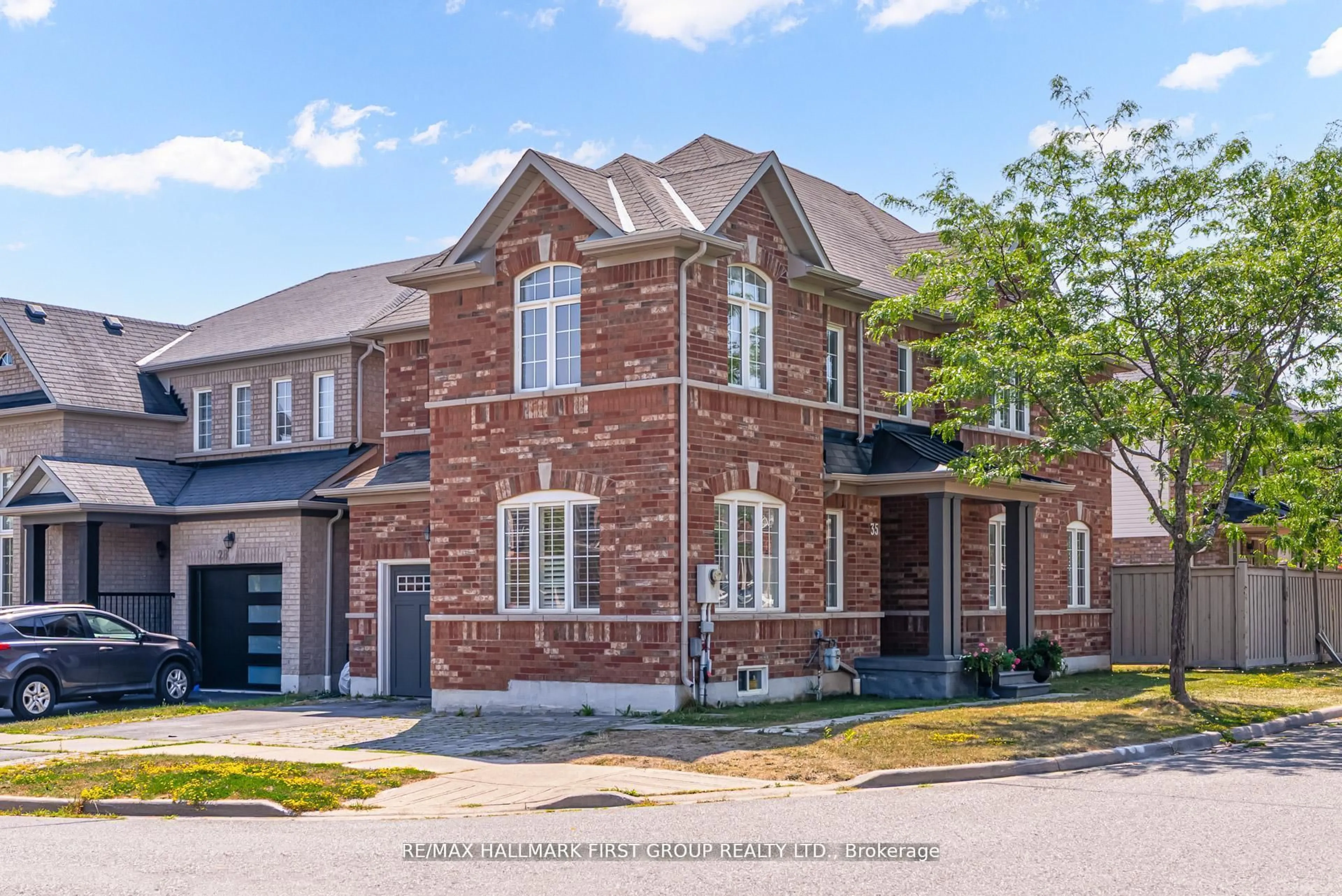 Home with brick exterior material, street for 35 Elliottglen Dr, Ajax Ontario L1Z 0H1
