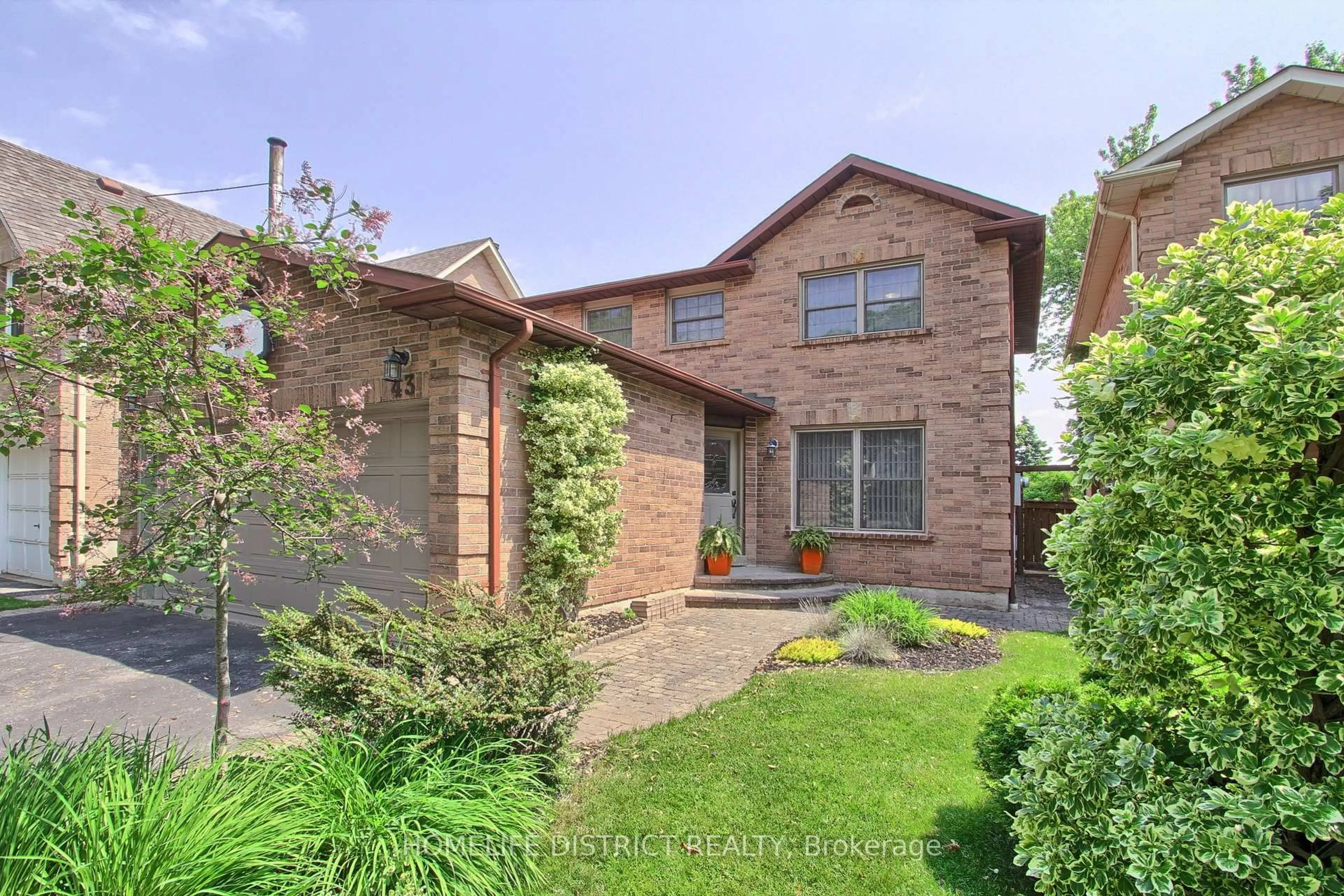 Home with brick exterior material, street for 43 Daniels Cres, Ajax Ontario L1T 1X8