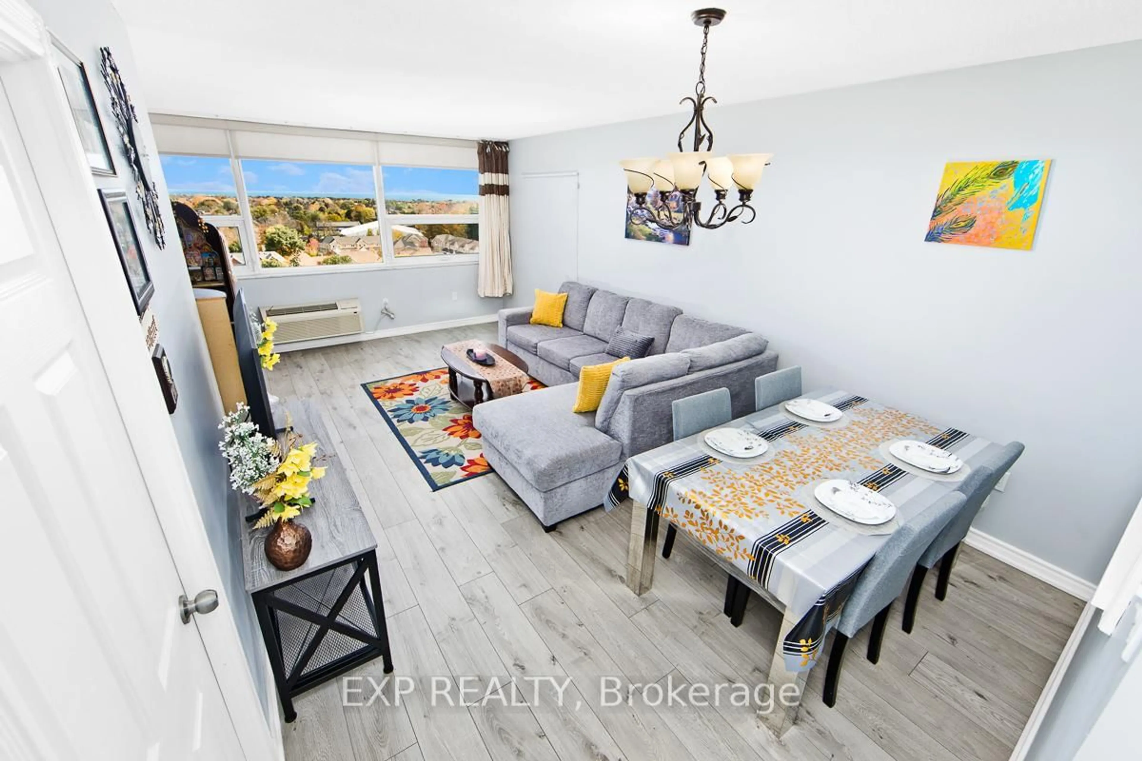 Living room with furniture, ceramic/tile floor for 121 Ling Rd #1111, Toronto Ontario M1E 4Y2