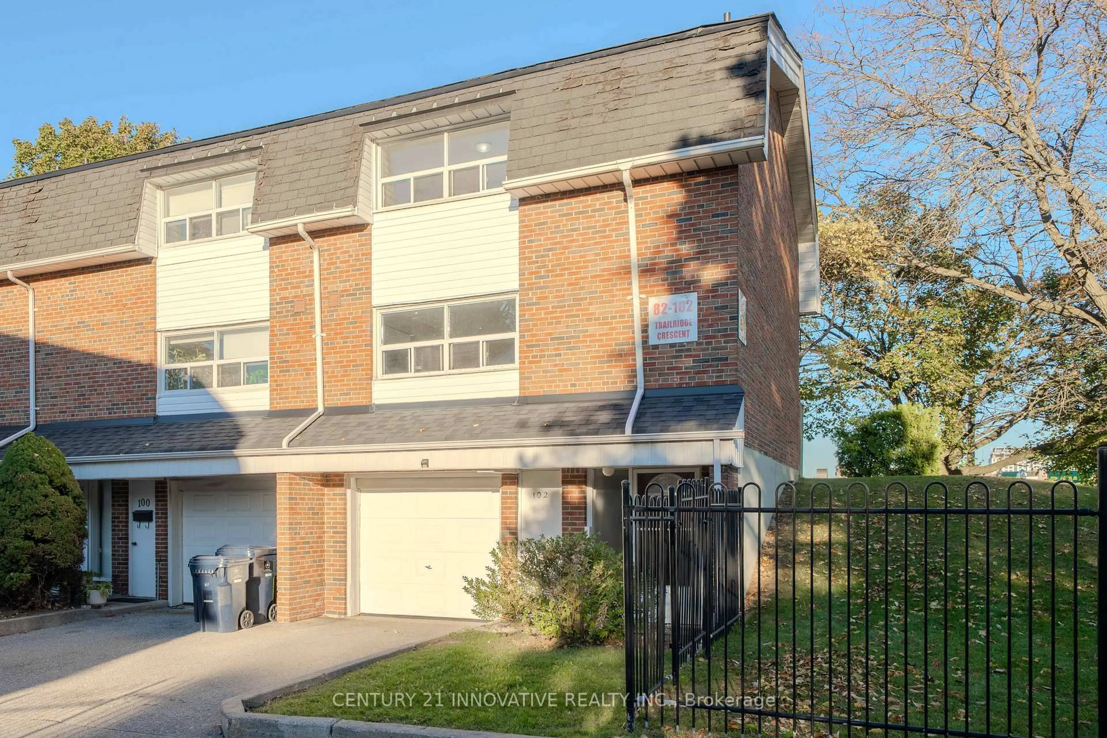 Home with brick exterior material, street for 102 Trailridge Cres #68, Toronto Ontario M1E 4C5