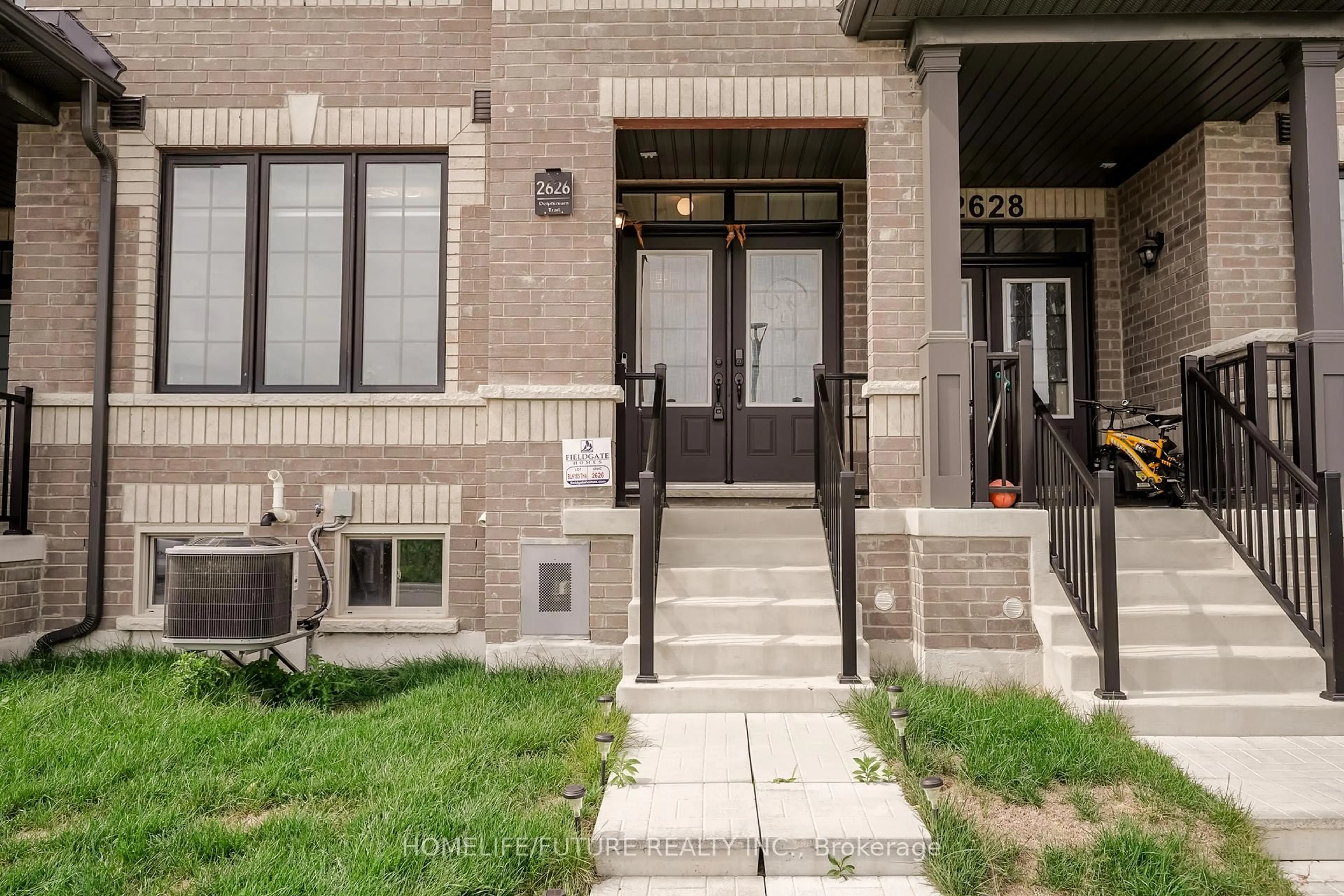 Home with brick exterior material, street for 2626 Delphinium Tr, Pickering Ontario L1X 0M1