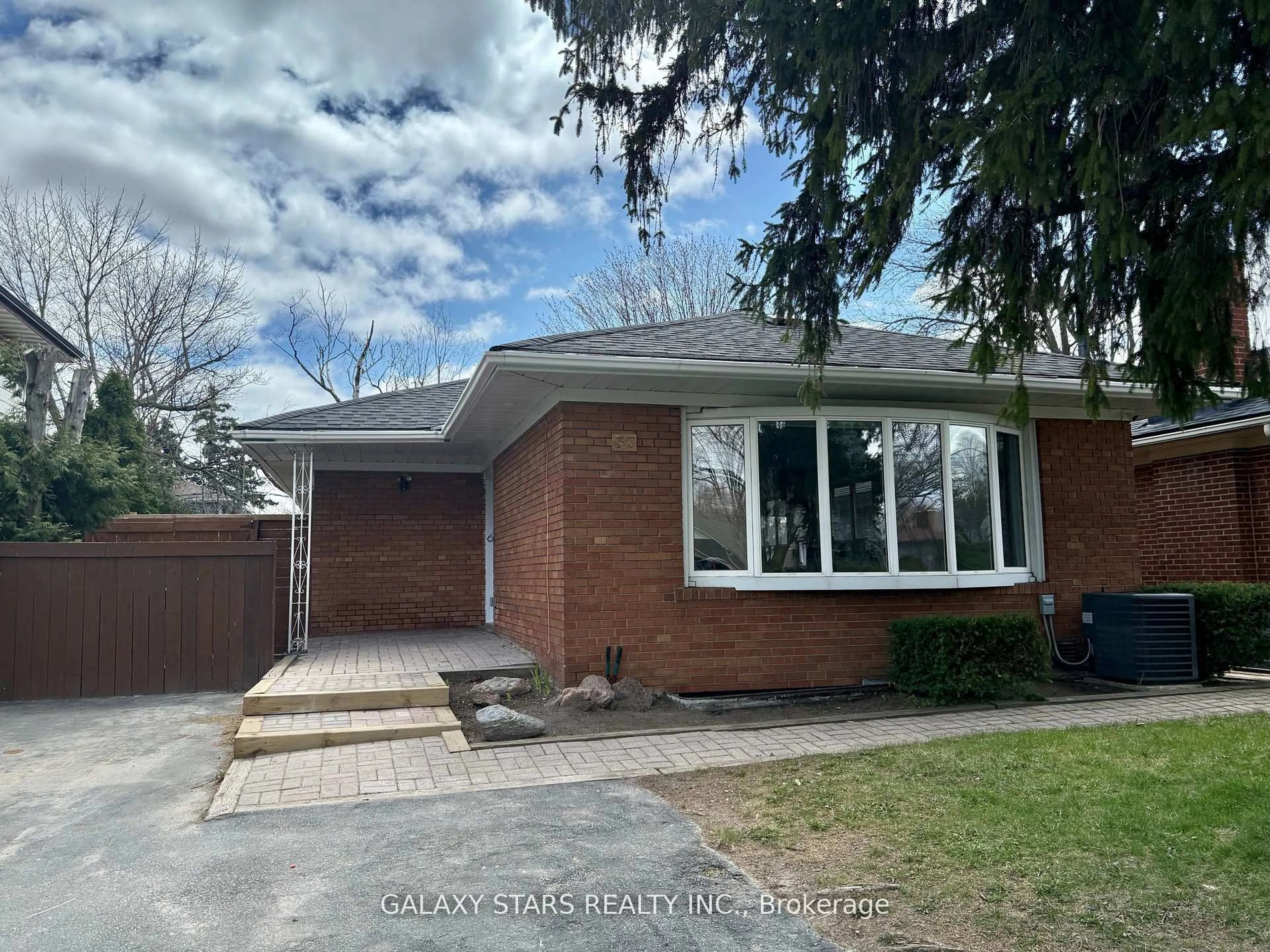 Home with brick exterior material, street for 57 Moorecroft Cres, Toronto Ontario M1K 3T9