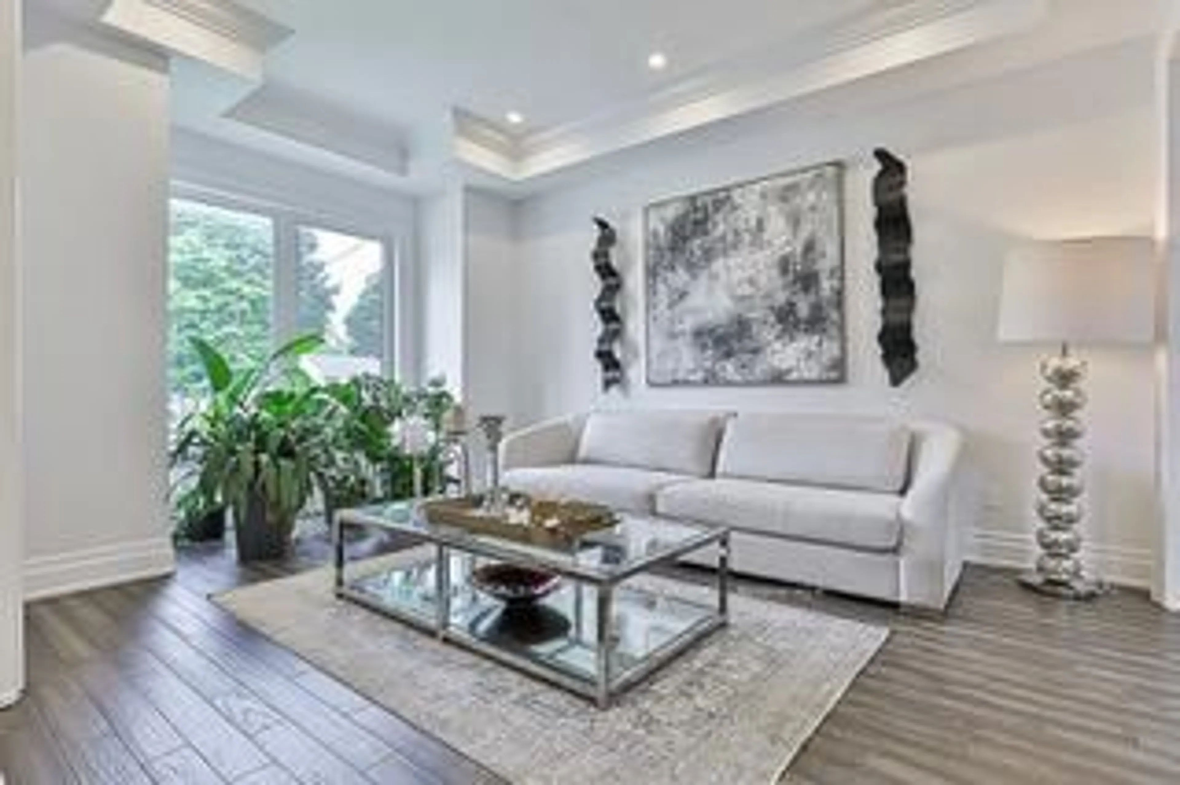 Living room with furniture, wood/laminate floor for 43 Buena Vista Ave, Toronto Ontario M1S 1J3