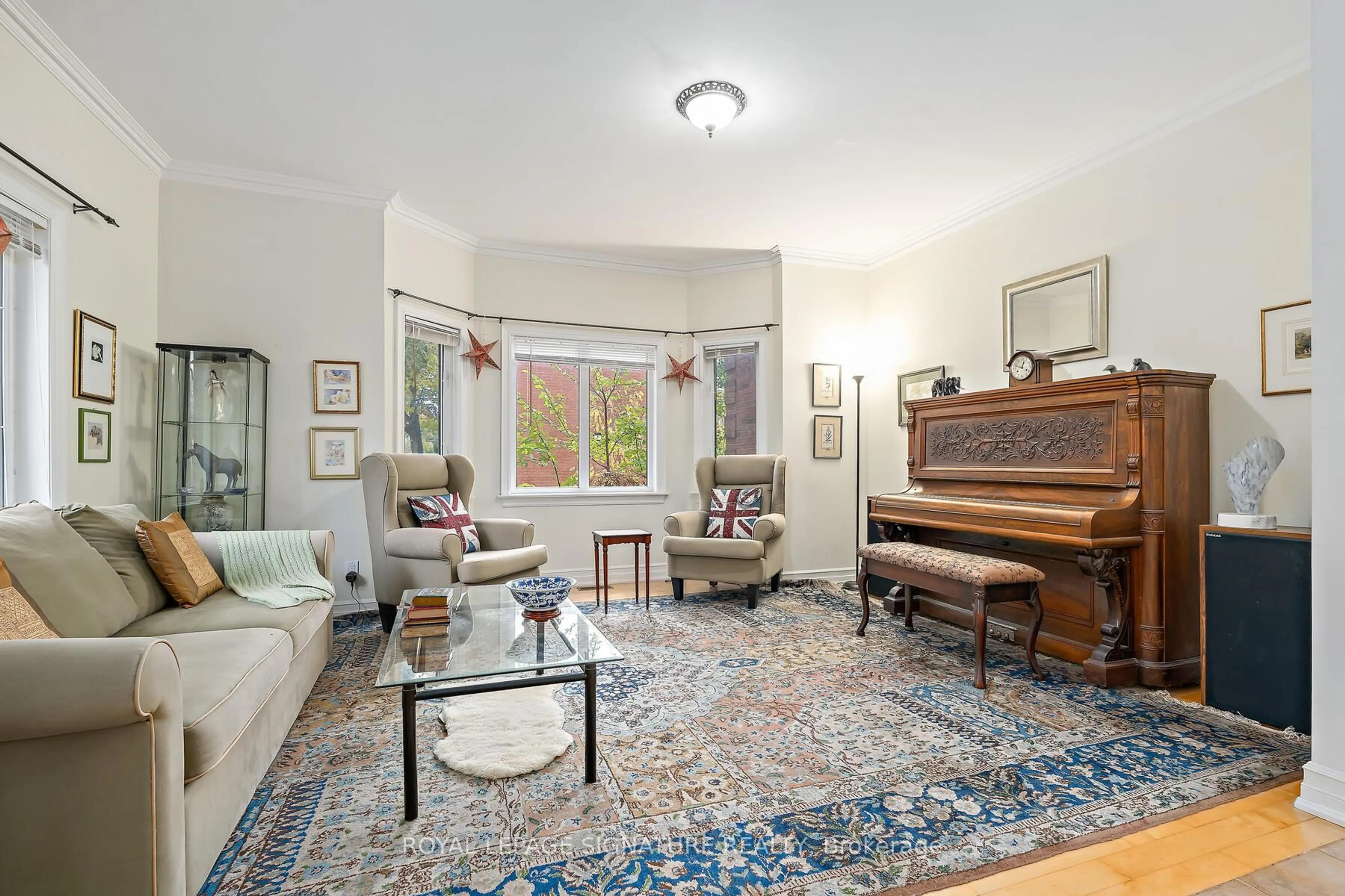 Living room with furniture, unknown for 110 Bowmore Rd, Toronto Ontario M4L 3J2