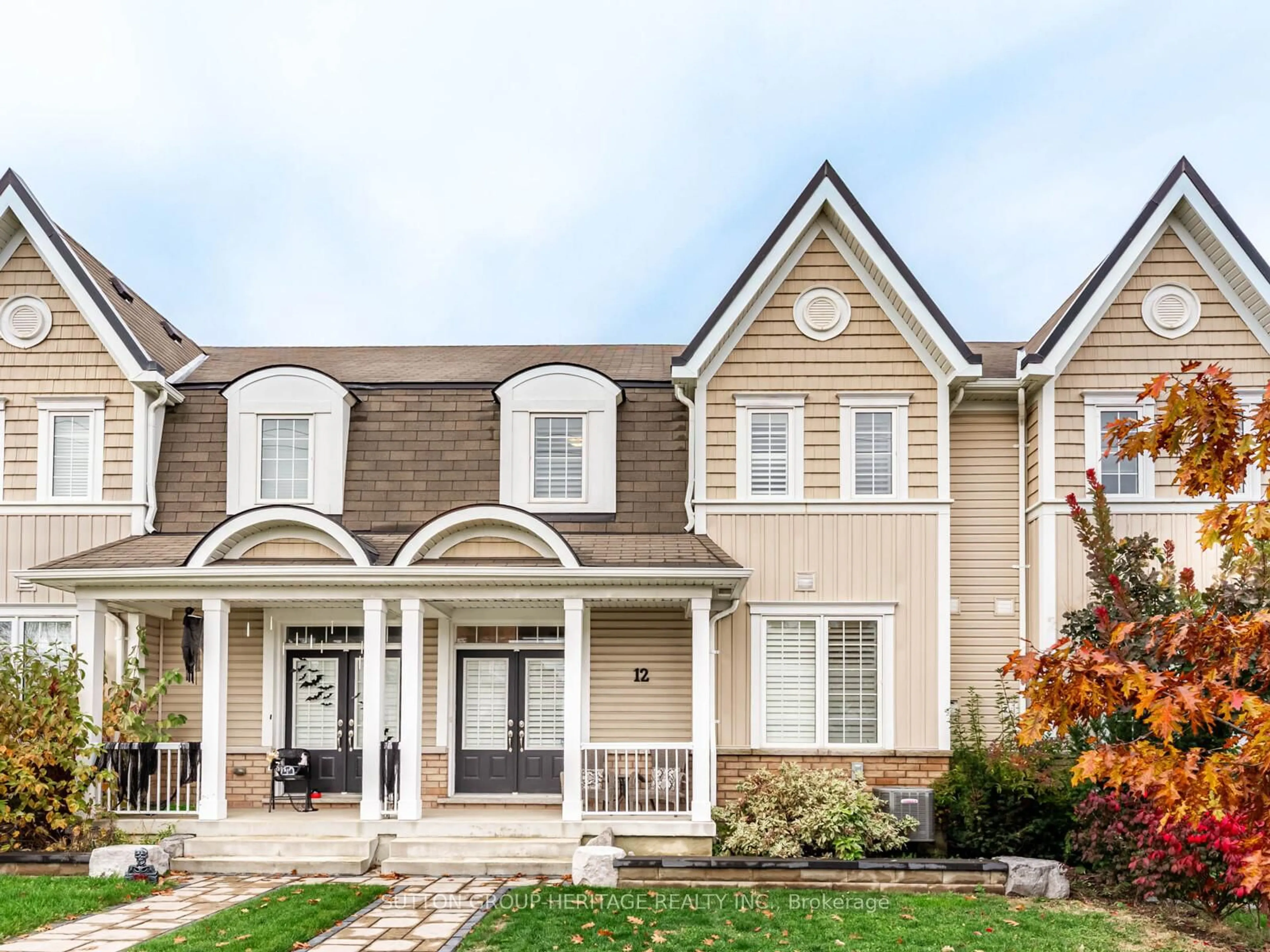 Home with vinyl exterior material, street for 12 Aller Park Way, Whitby Ontario L1M 0L5