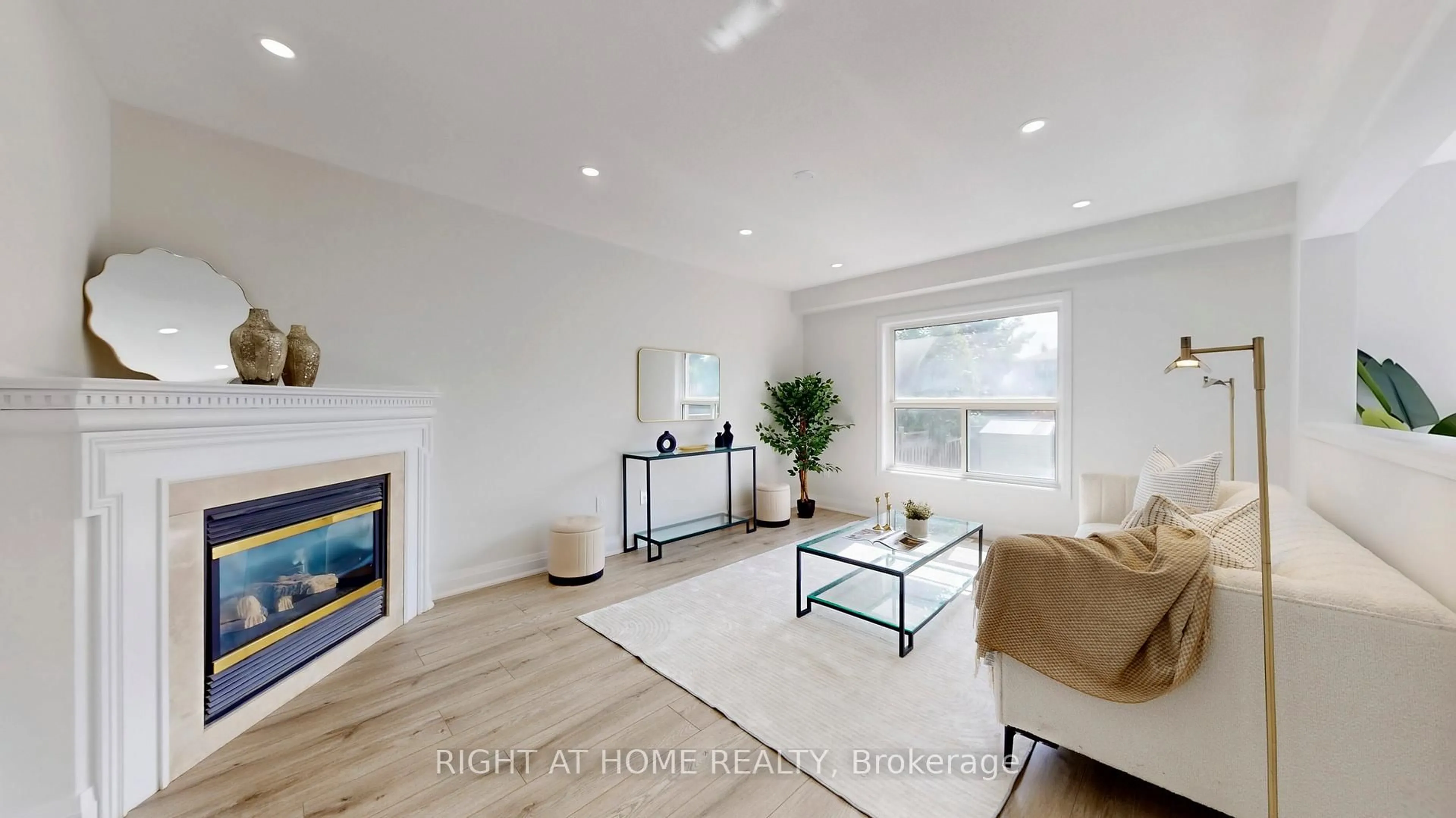 Living room with furniture, wood/laminate floor for 55 Tilley Rd, Clarington Ontario L1C 4M3