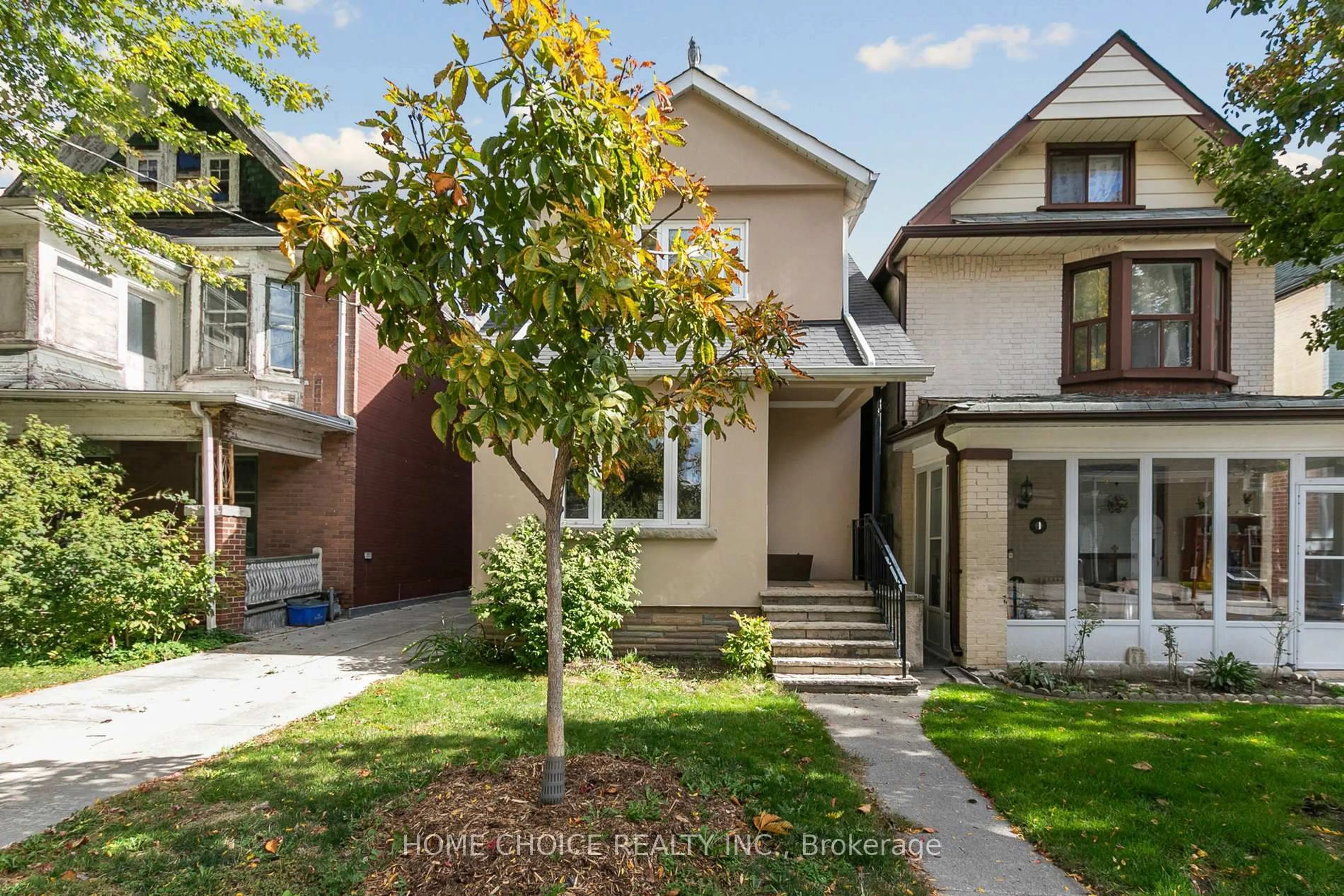 Home with brick exterior material, street for 283 Ashdale Ave, Toronto Ontario M4L 2Z1