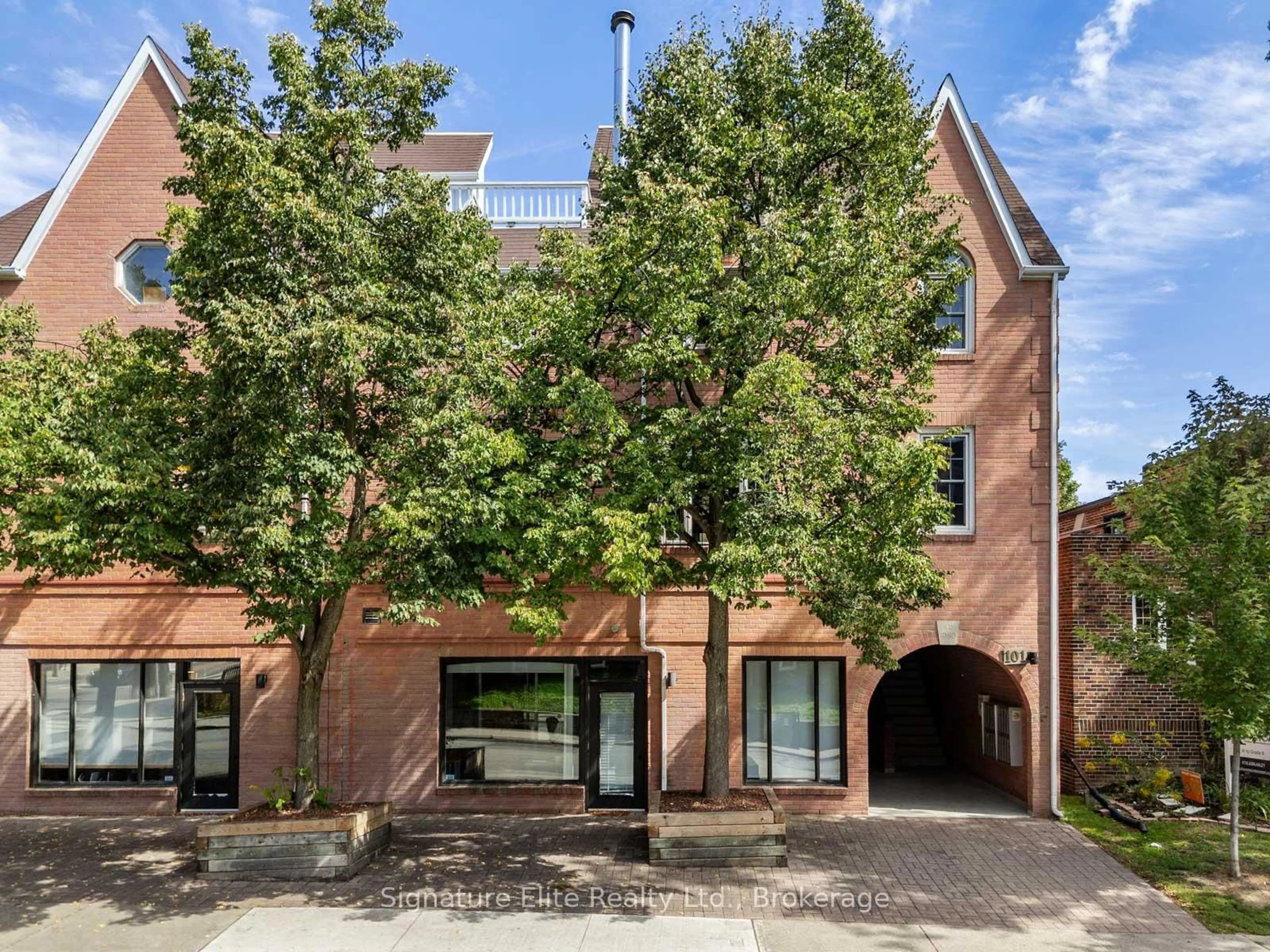 Home with brick exterior material, street for 101 Glen Manor Dr #13, Toronto Ontario M4E 3V3