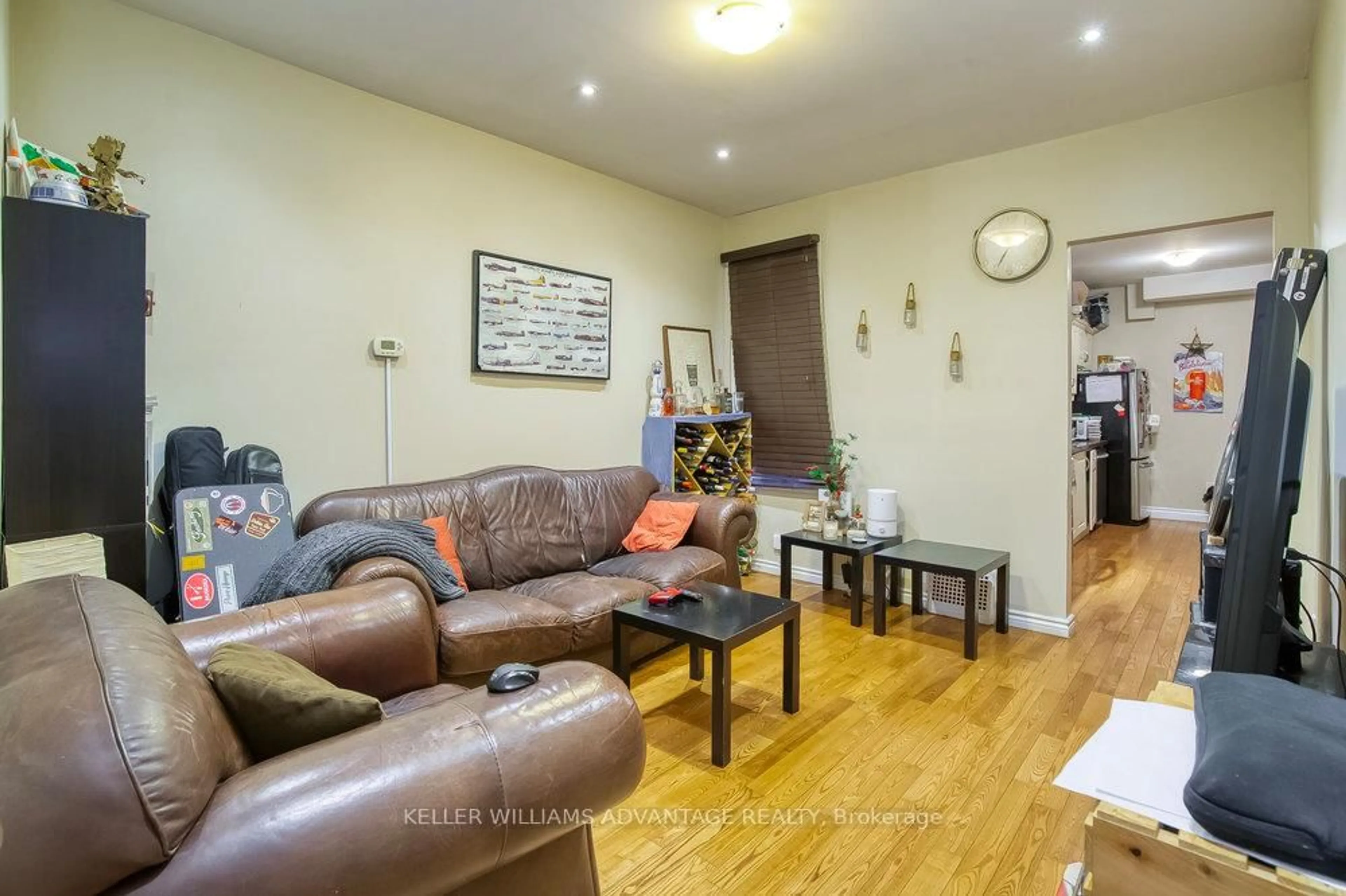 Living room with furniture, wood/laminate floor for 218 Broadview Ave, Toronto Ontario M4M 2G5