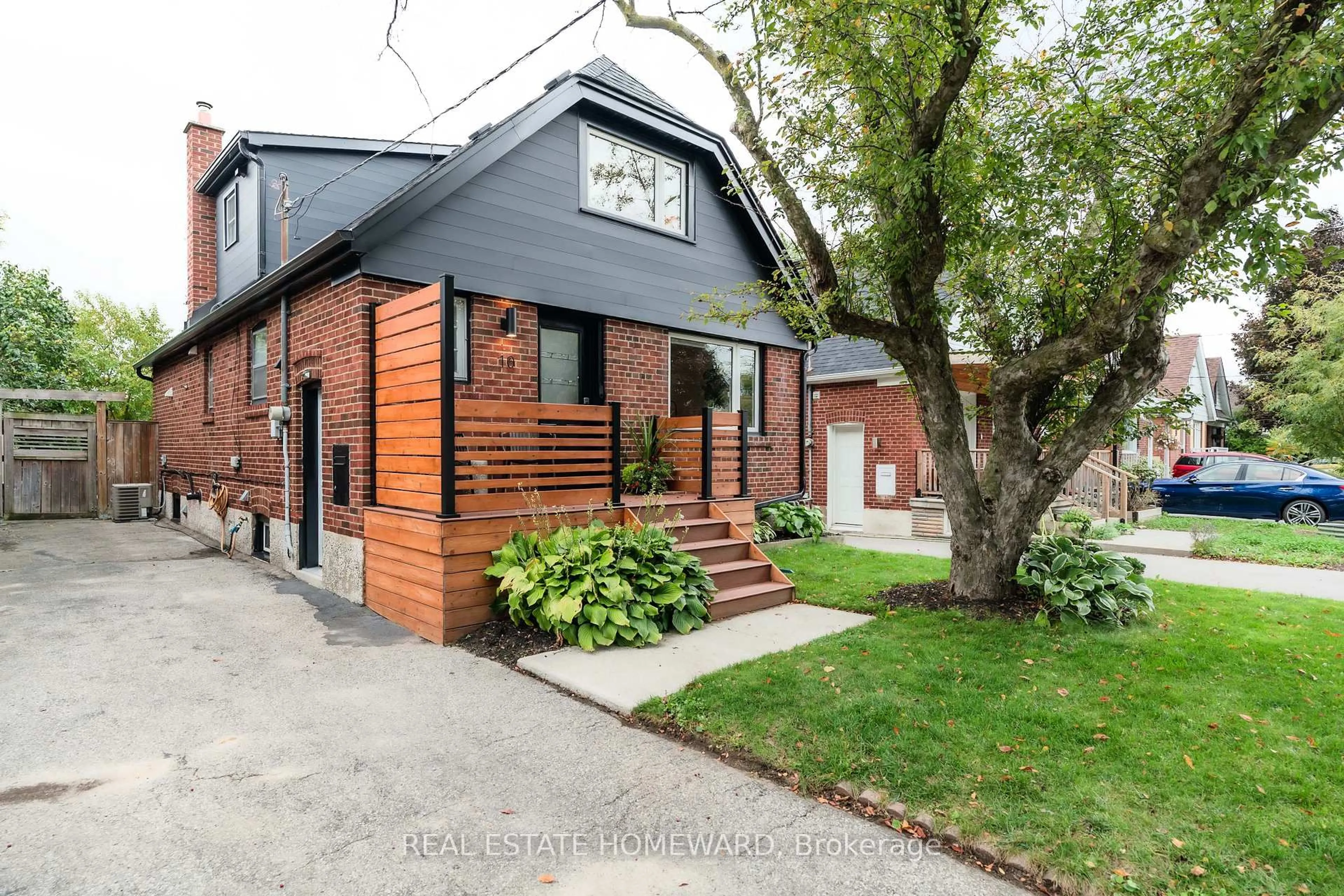 Home with brick exterior material, street for 10 Norlong Blvd, Toronto Ontario M4C 3W6