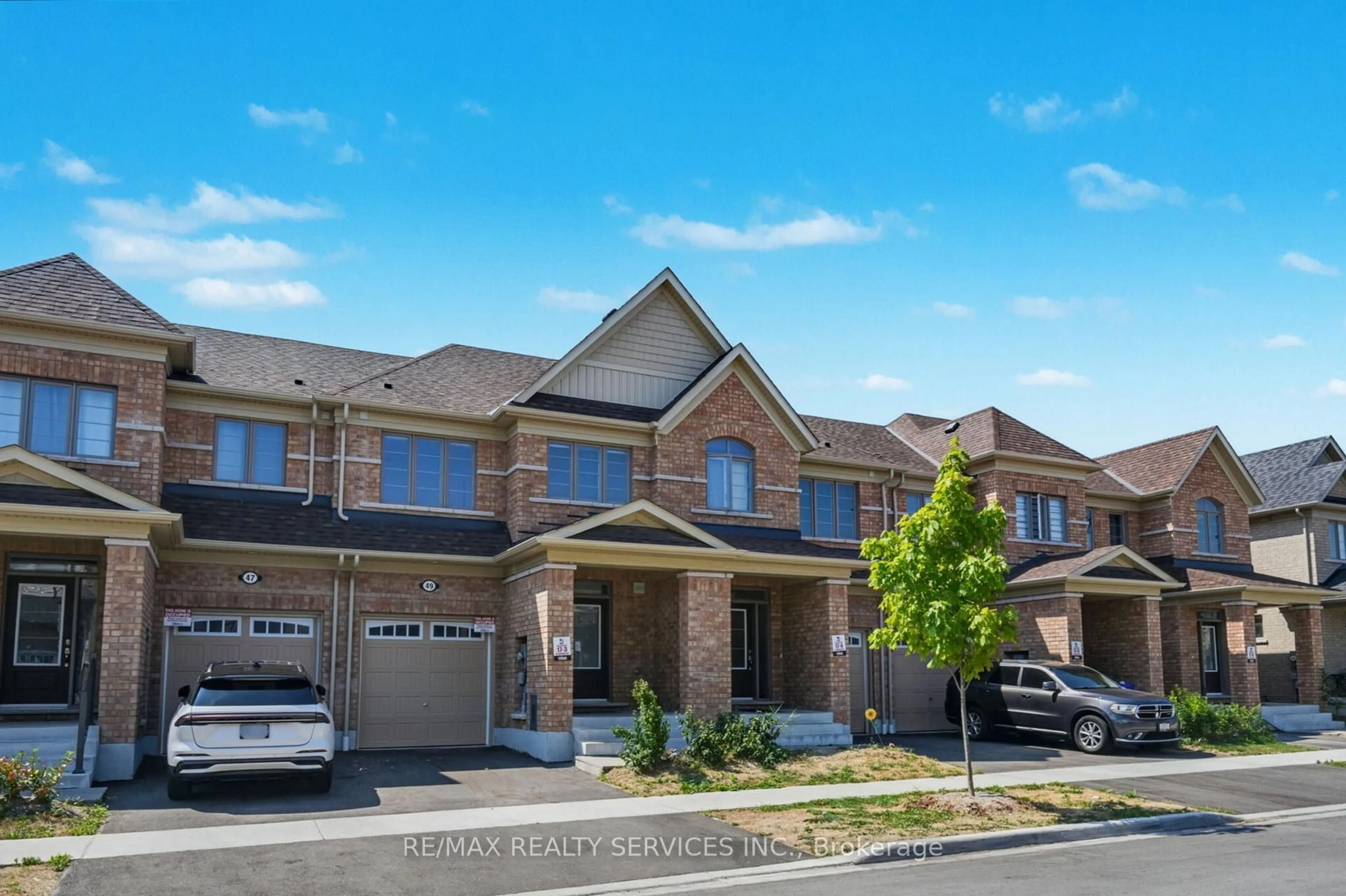 Home with brick exterior material, street for 49 Bayardo Dr, Oshawa Ontario L1L 0V2