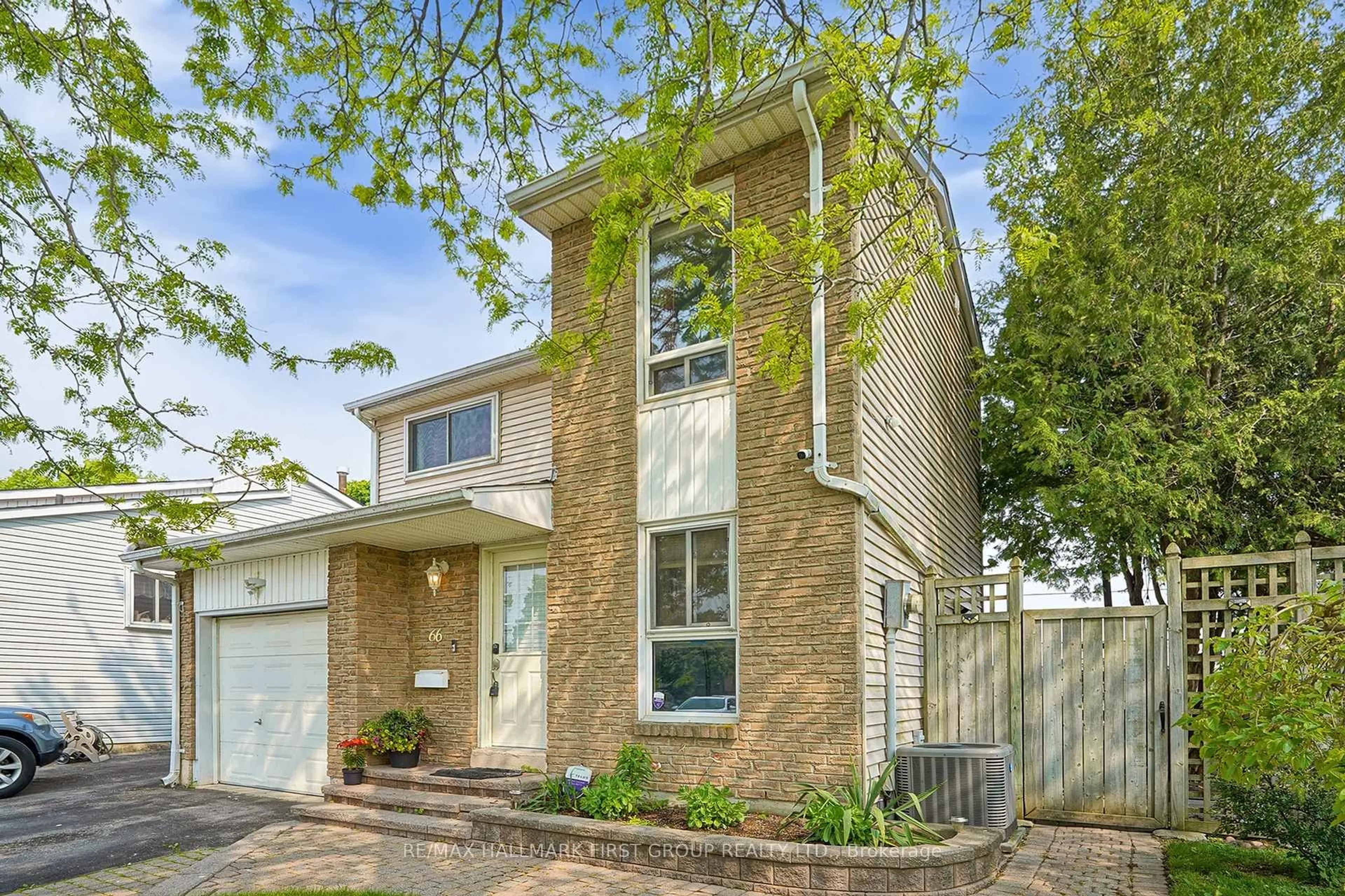 Home with brick exterior material, street for 66 Medley Lane, Ajax Ontario L1S 3P6