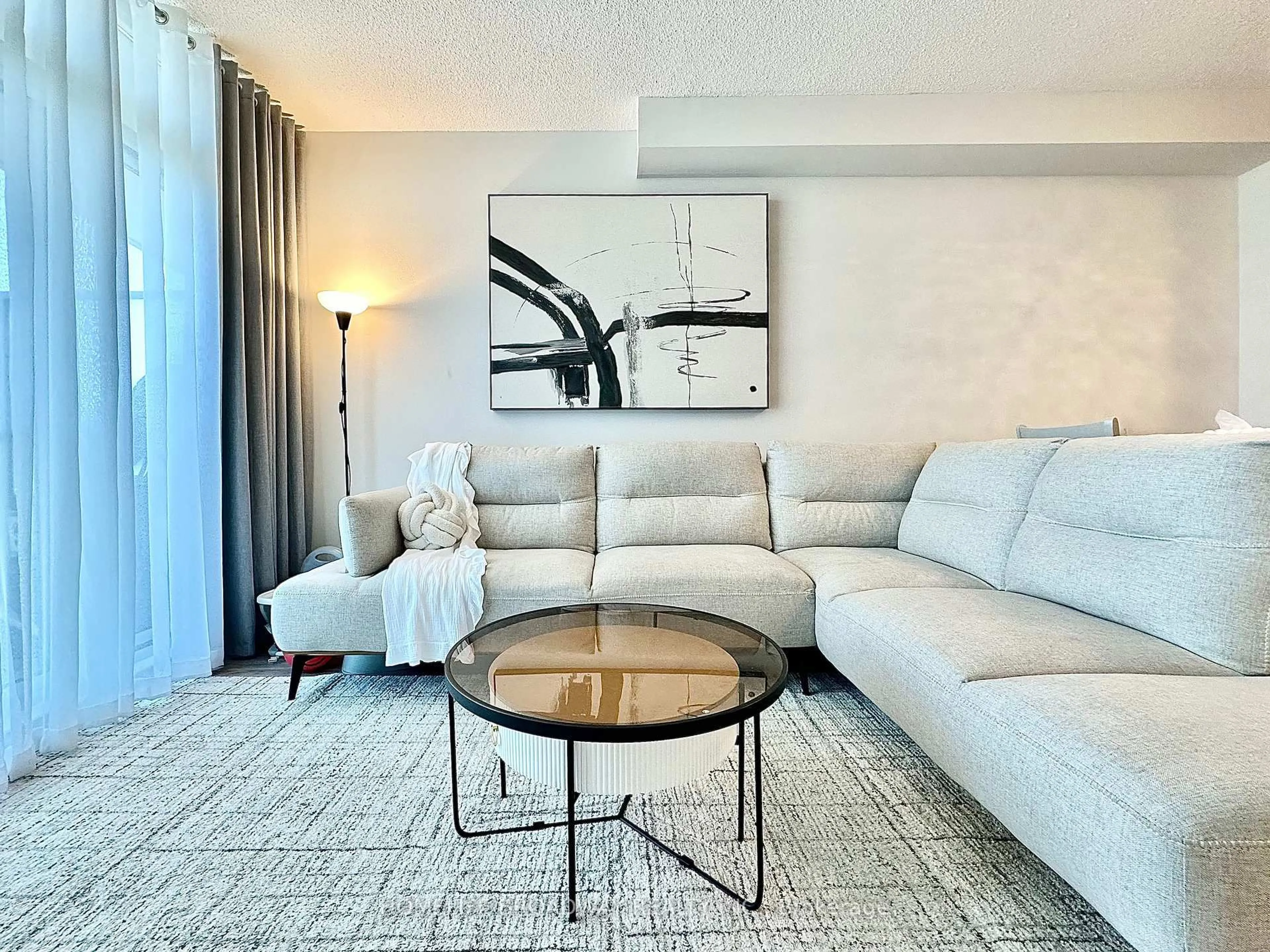 Living room with furniture, unknown for 1328 Birchmount Rd #1604, Toronto Ontario M1R 0B6