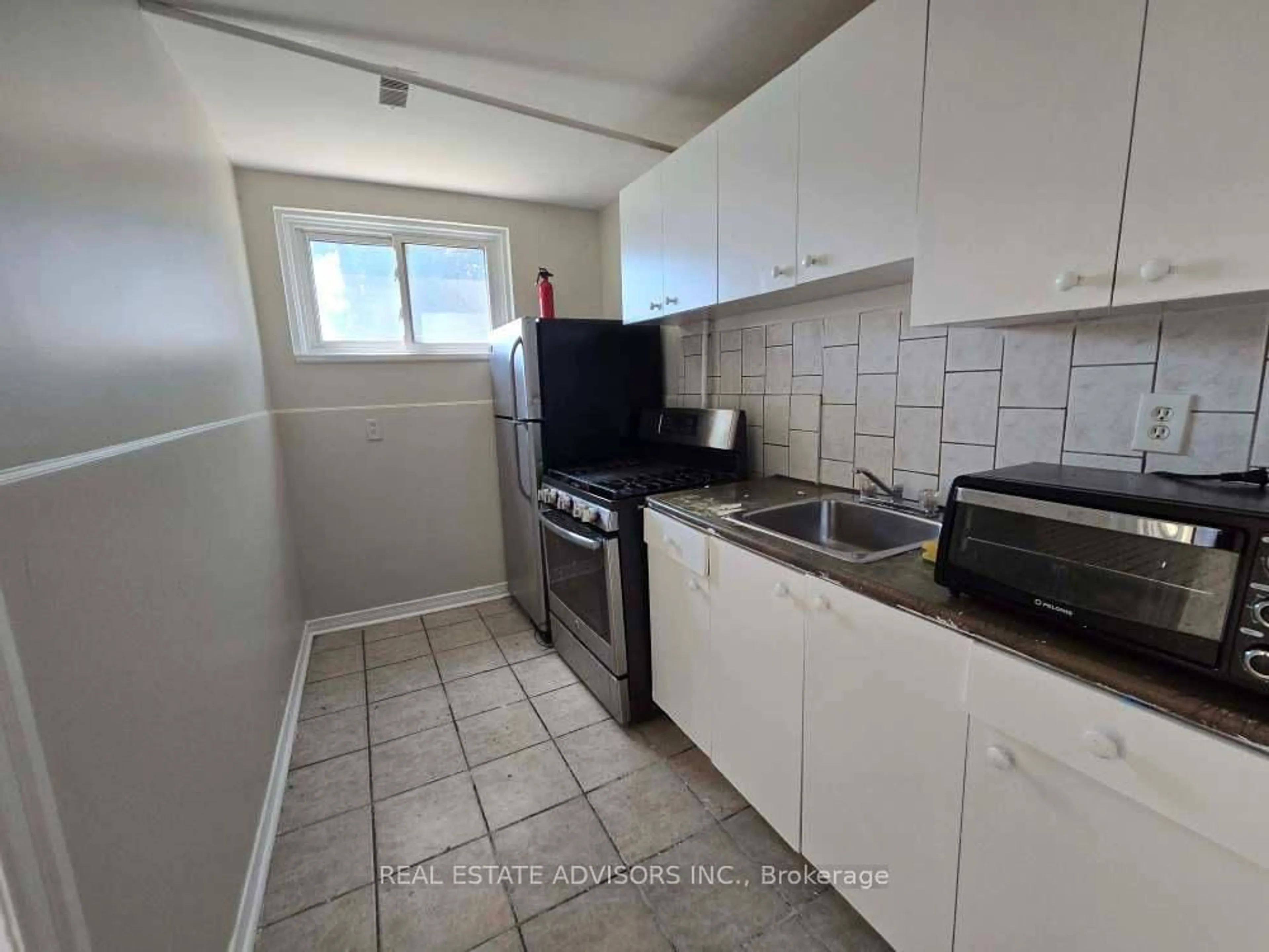 Standard kitchen, unknown for 56 Jeavons Ave, Toronto Ontario M1K 1T2