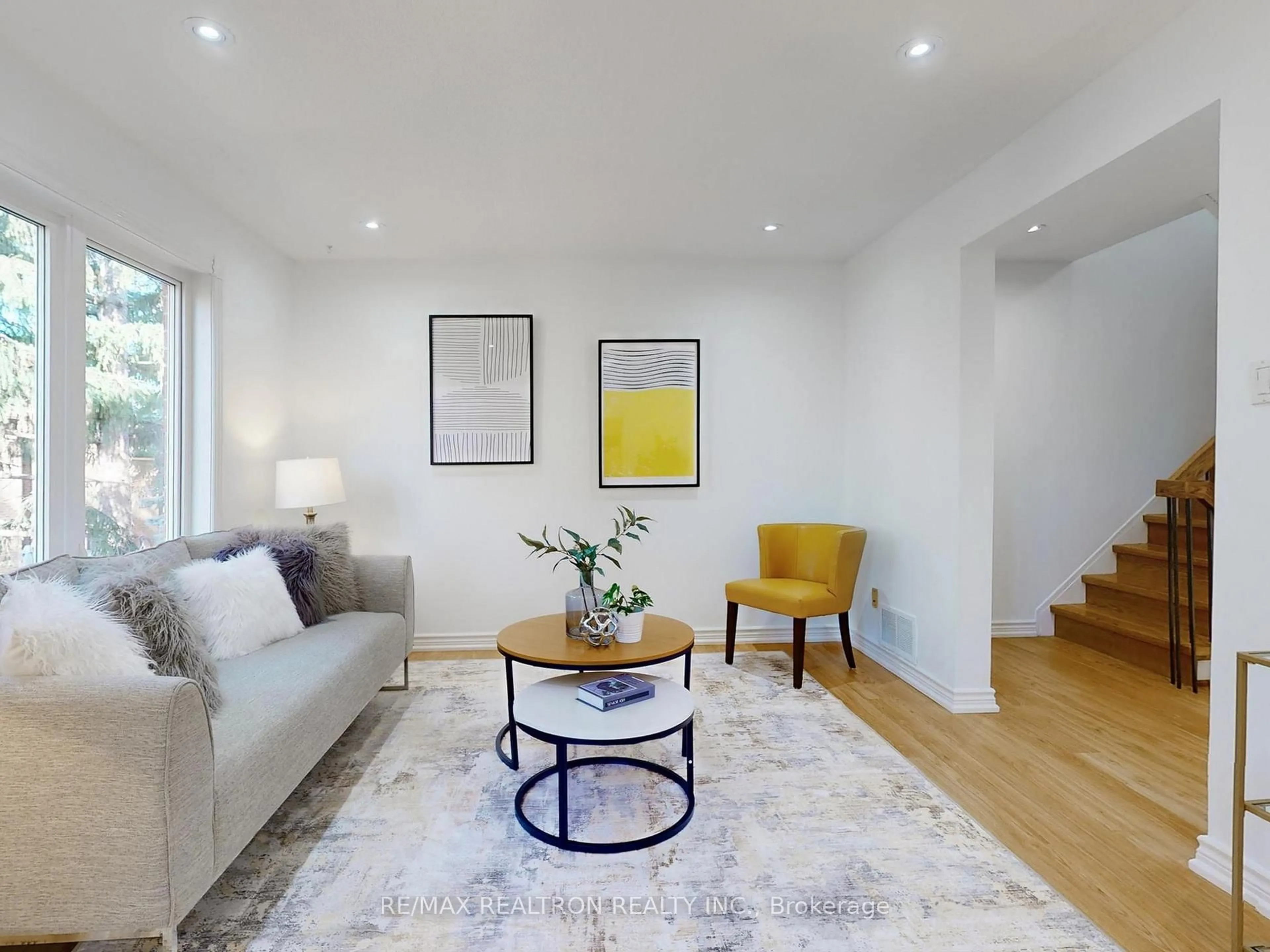 Living room with furniture, wood/laminate floor for 5021 Sheppard Ave #9, Toronto Ontario M1S 4R6