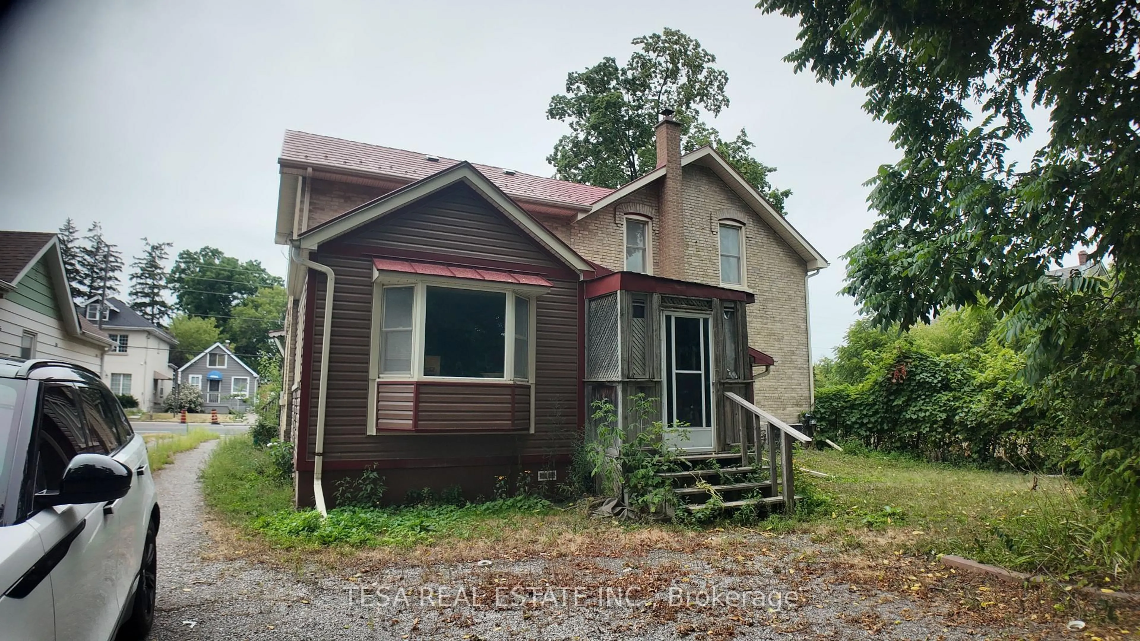 Home with brick exterior material, building for 65 Park Rd, Oshawa Ontario L1J 4G7