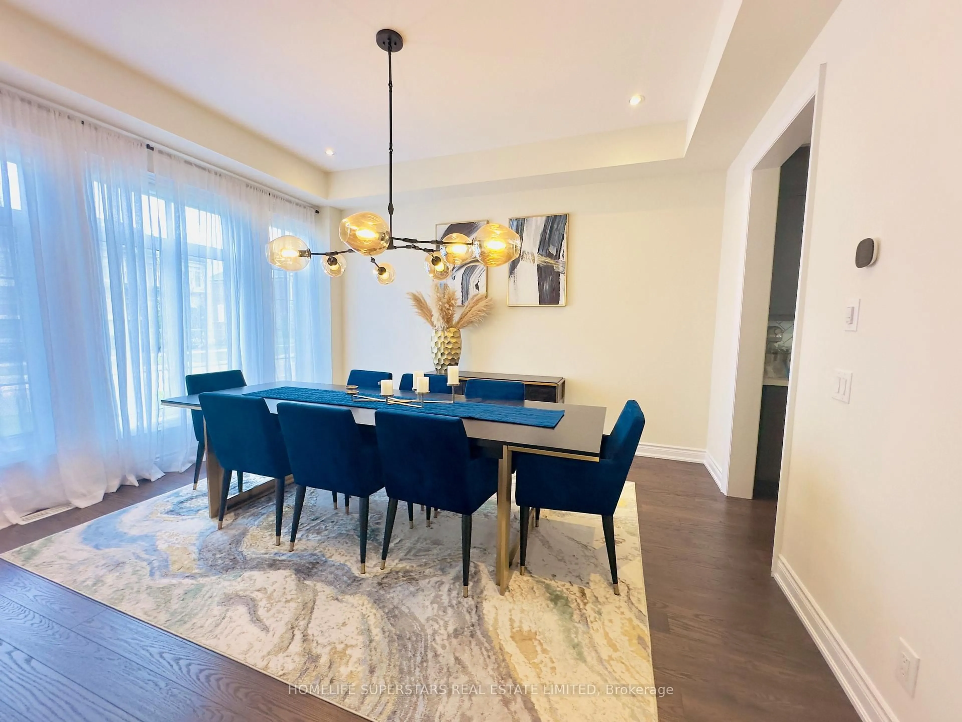 Dining room, wood/laminate floor for 55 Christine Elliott Ave, Whitby Ontario L1P 0C8