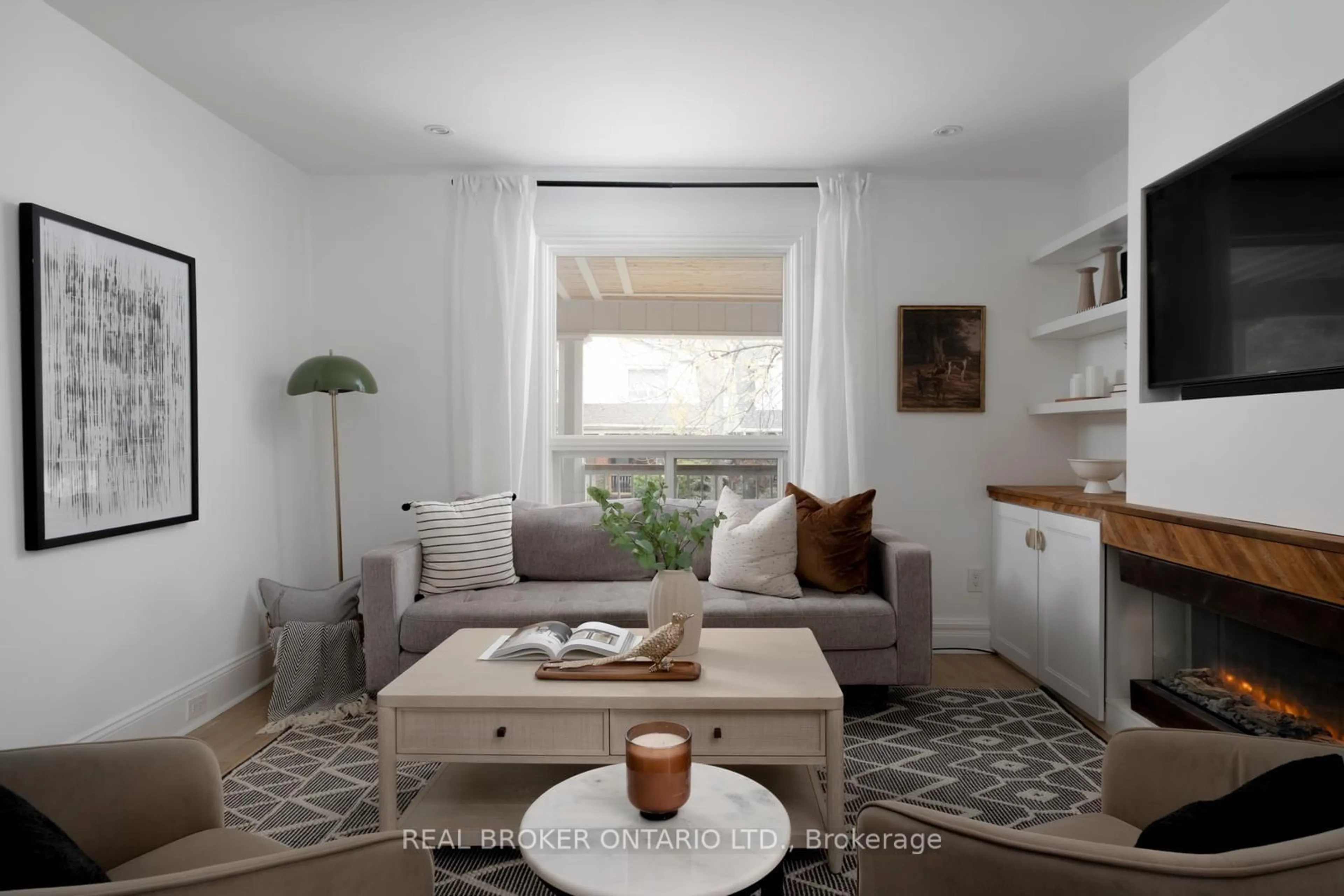 Living room with furniture, unknown for 21 Stephenson Ave, Toronto Ontario M4C 1E9