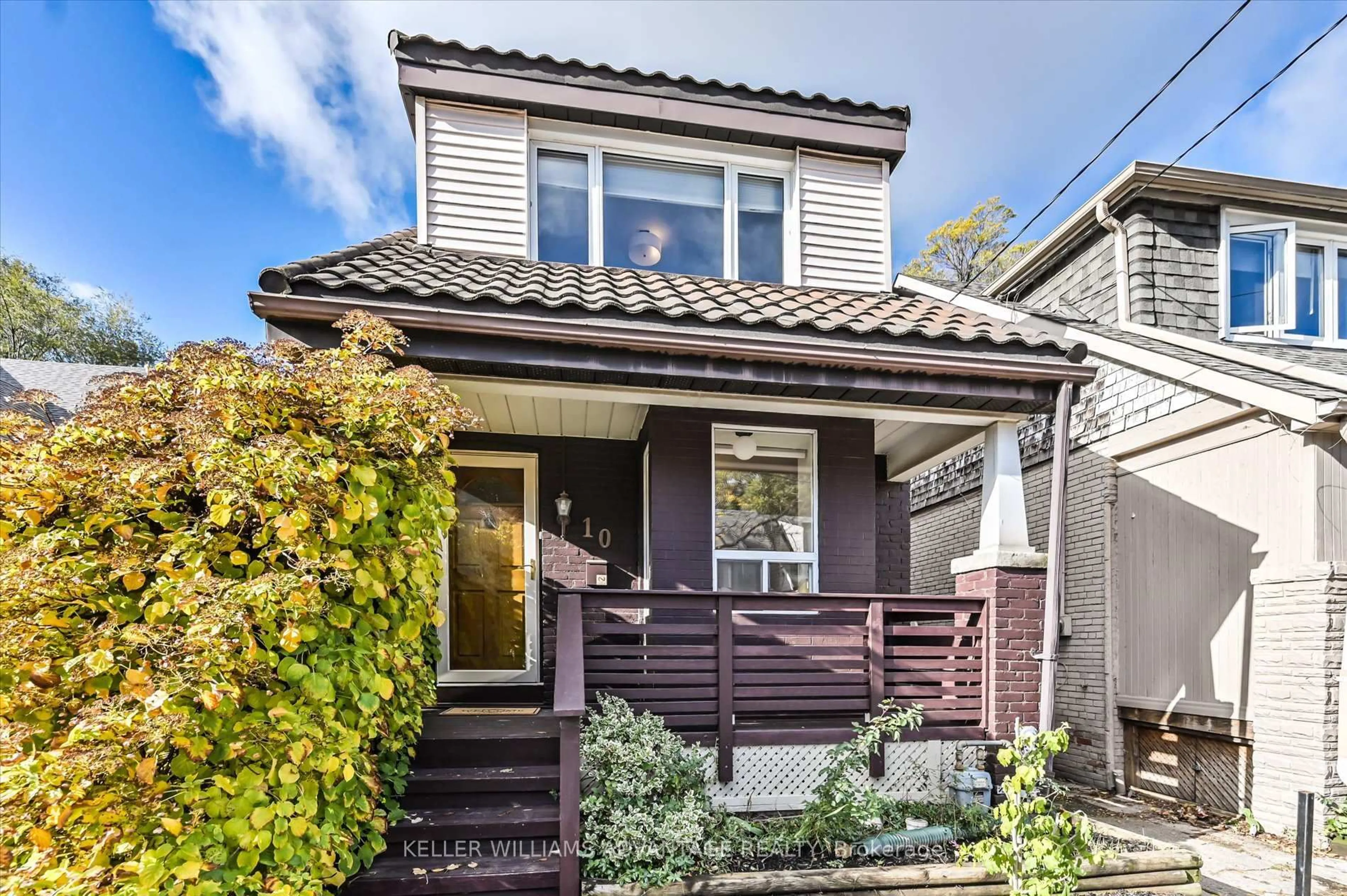 Home with vinyl exterior material, street for 10 Amroth Ave, Toronto Ontario M4C 4H2