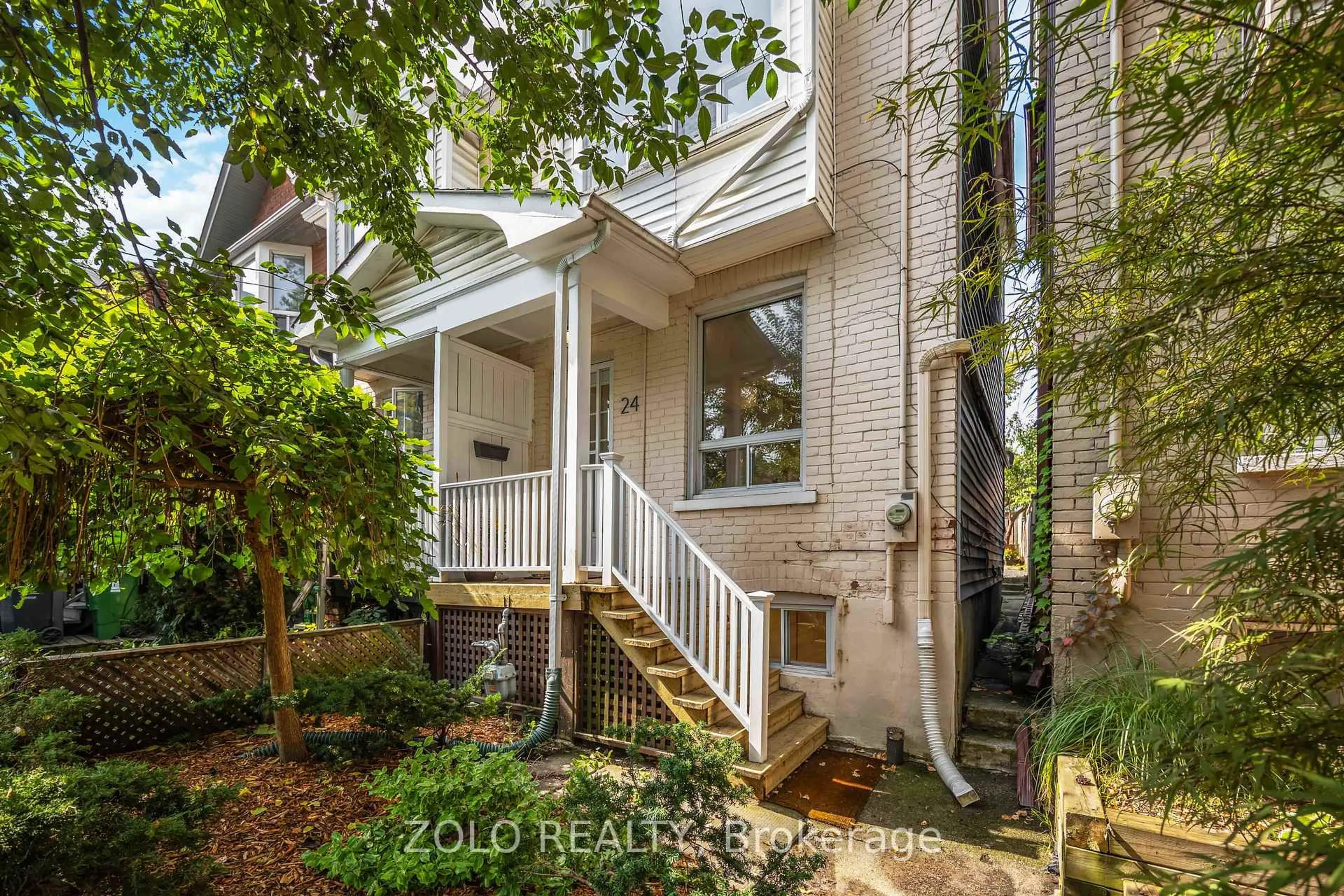 Home with brick exterior material, street for 24 Poucher St, Toronto Ontario M4J 2Y9