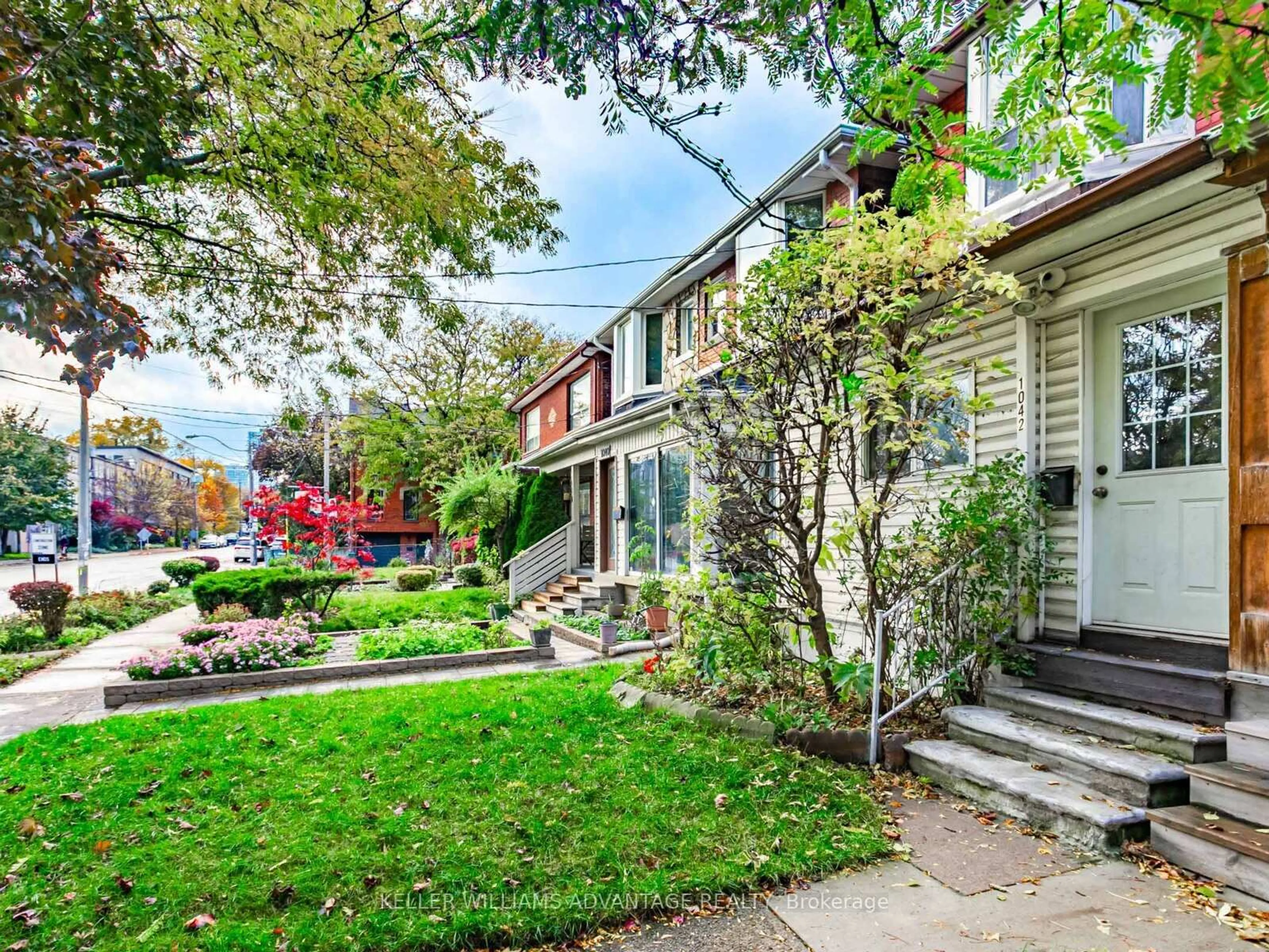 Home with brick exterior material, street for 1042 Dundas St, Toronto Ontario M4M 1R8